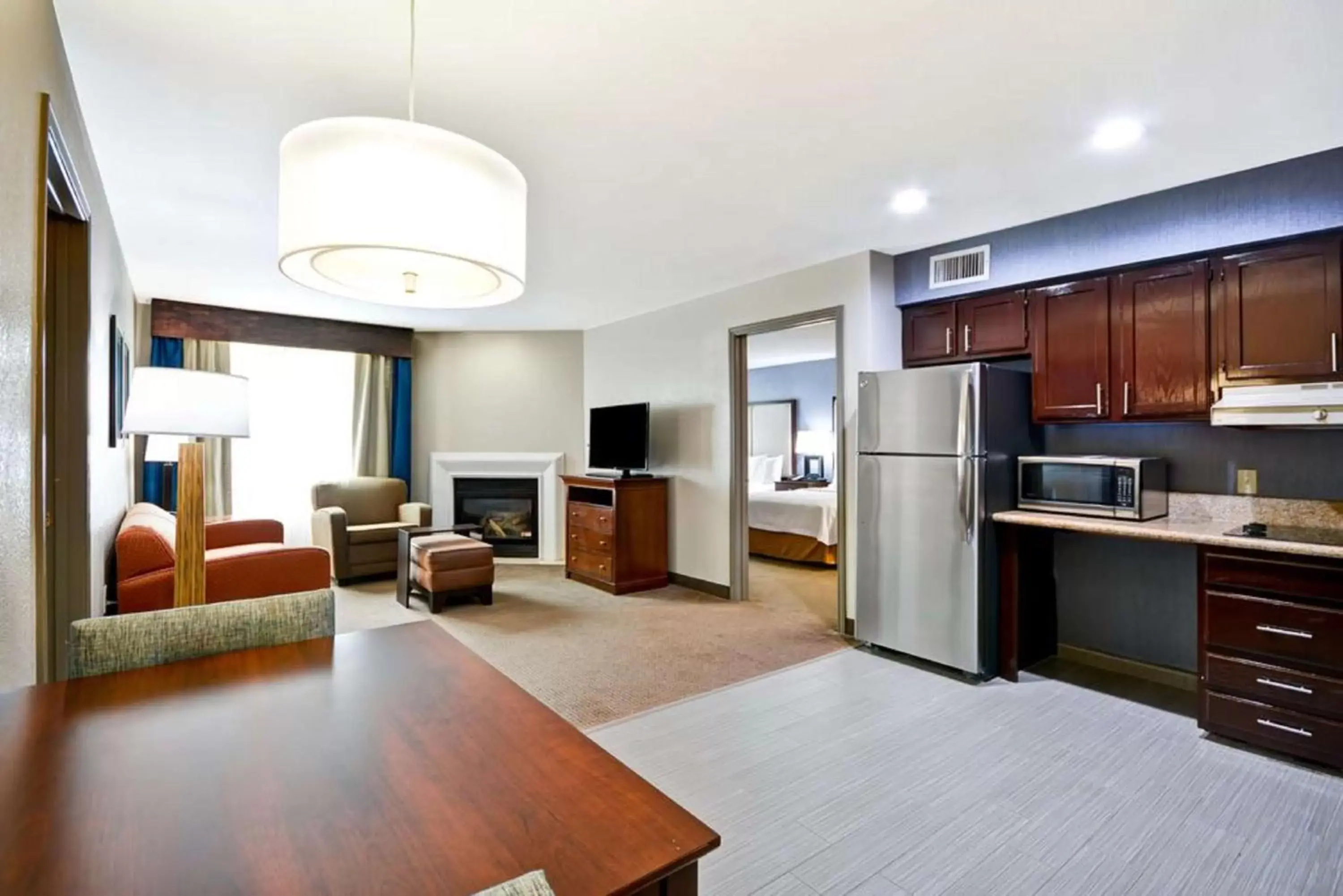 Bedroom, Kitchen/Kitchenette in Homewood Suites by Hilton Dallas-Lewisville