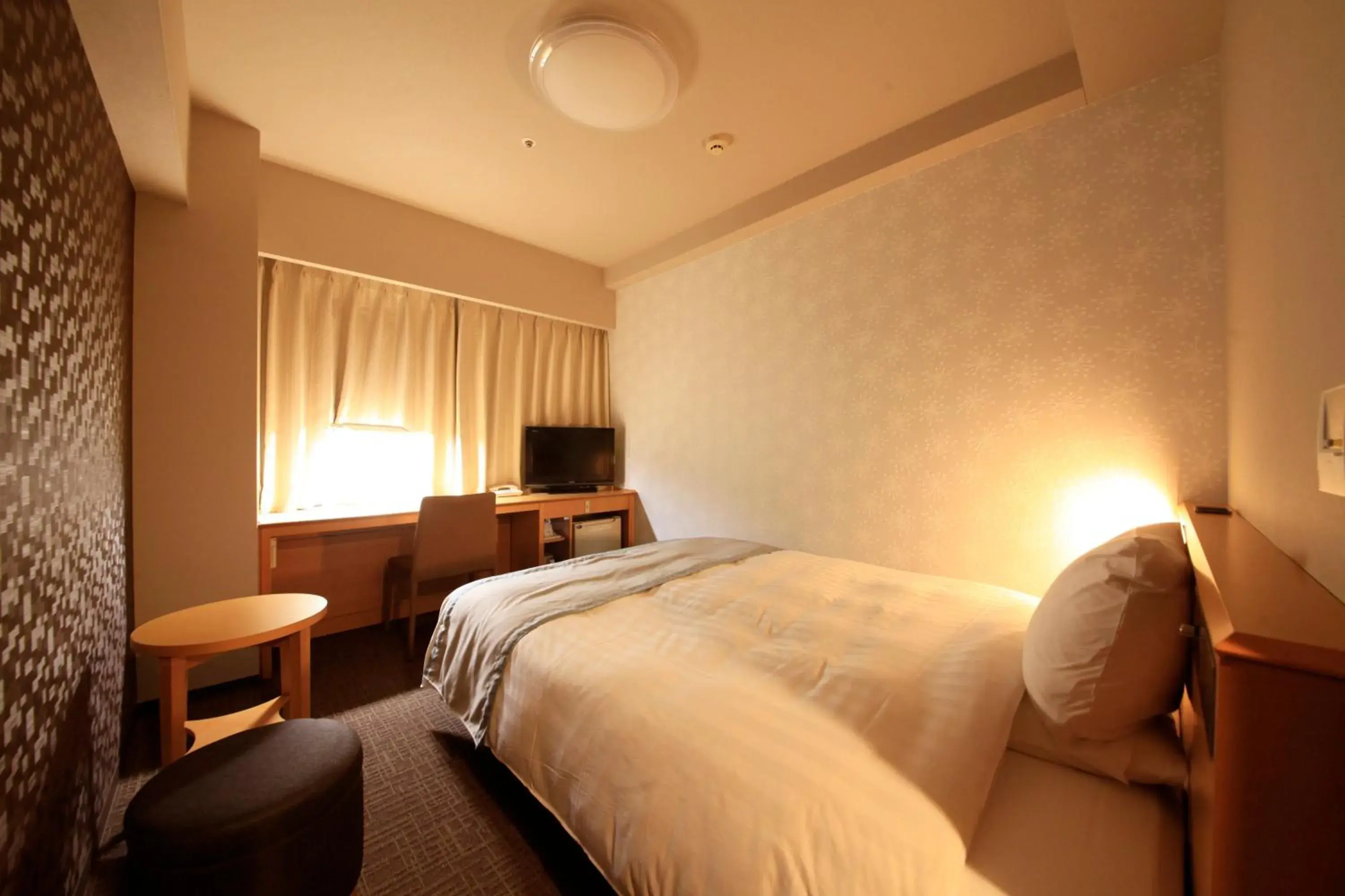 Photo of the whole room, Bed in Richmond Hotel Sapporo Ekimae