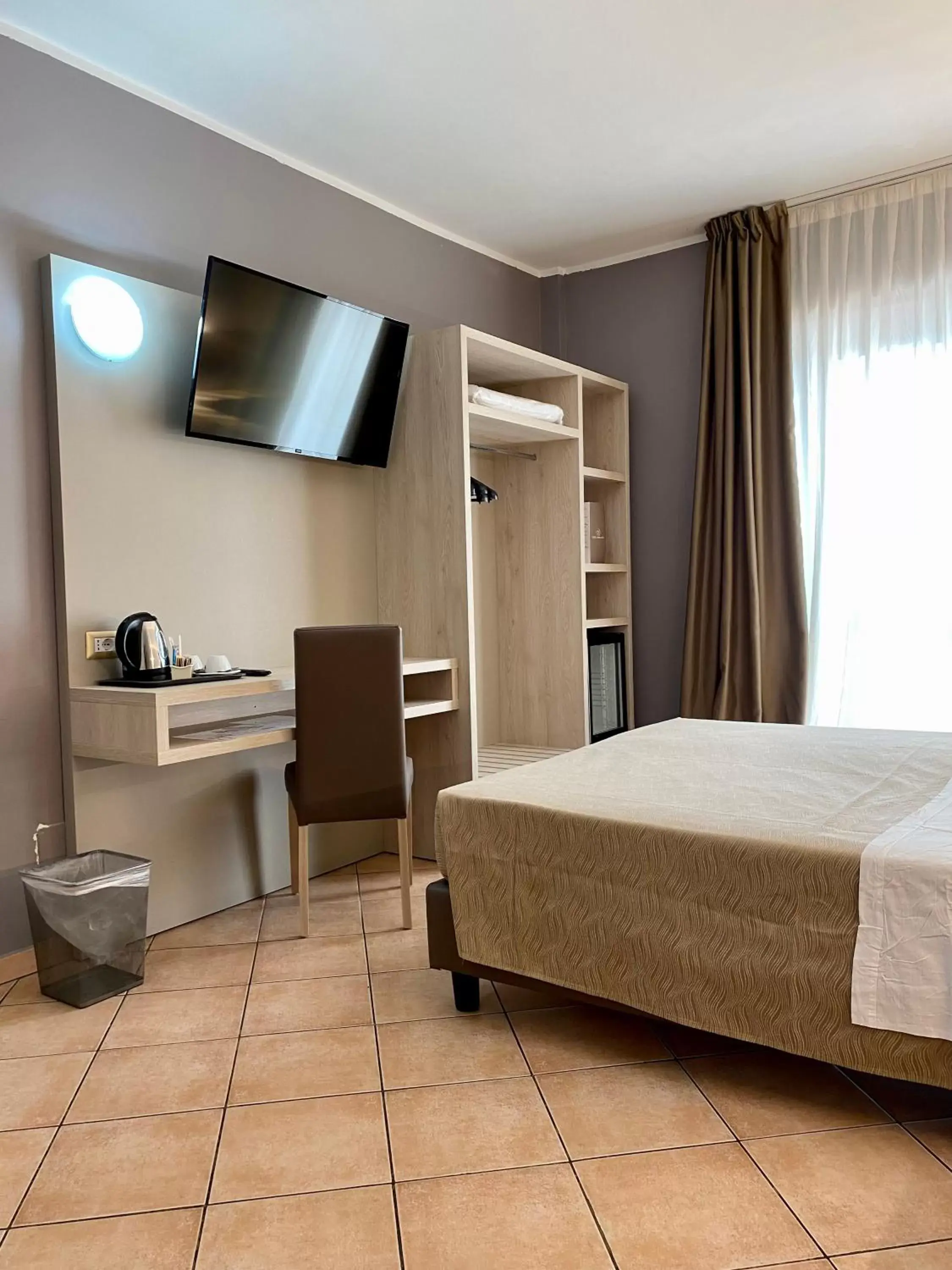 TV and multimedia, Bed in Hotel Miramonti TV and multimedia, Bed in Hotel Miramonti