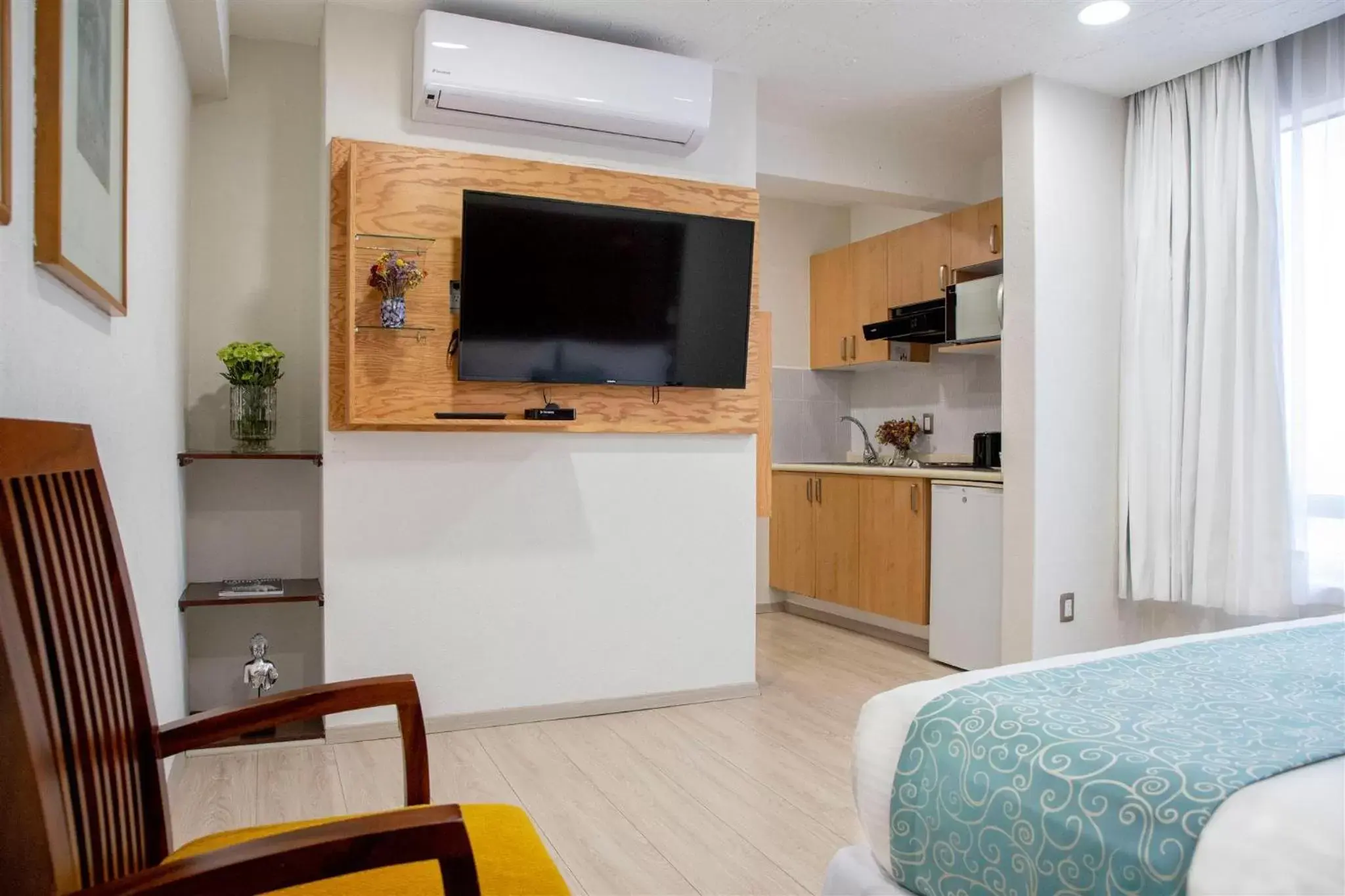 TV and multimedia, TV/Entertainment Center in Suites Coben Apartamentos Amueblados
