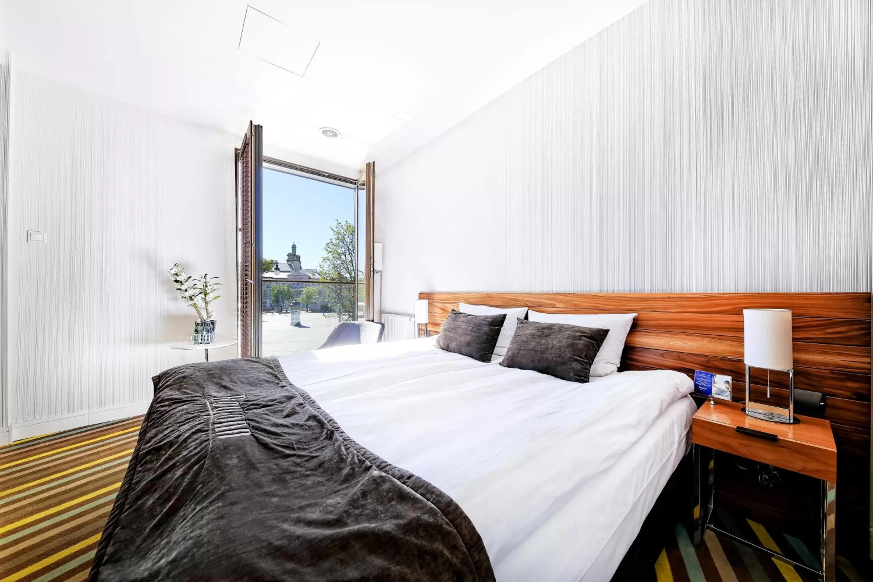 Bed in Bayjonn Boutique Hotel