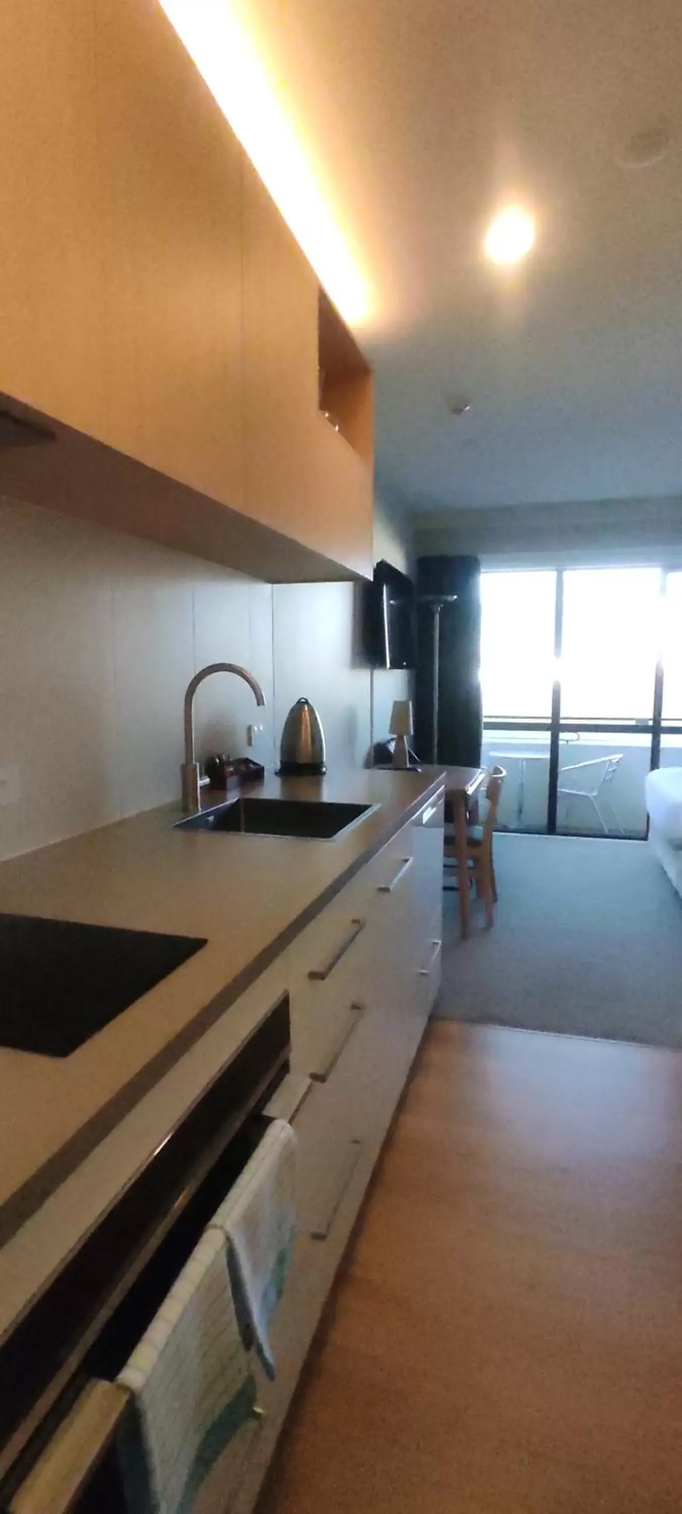 Kitchen/Kitchenette in West Fitzroy Apartments