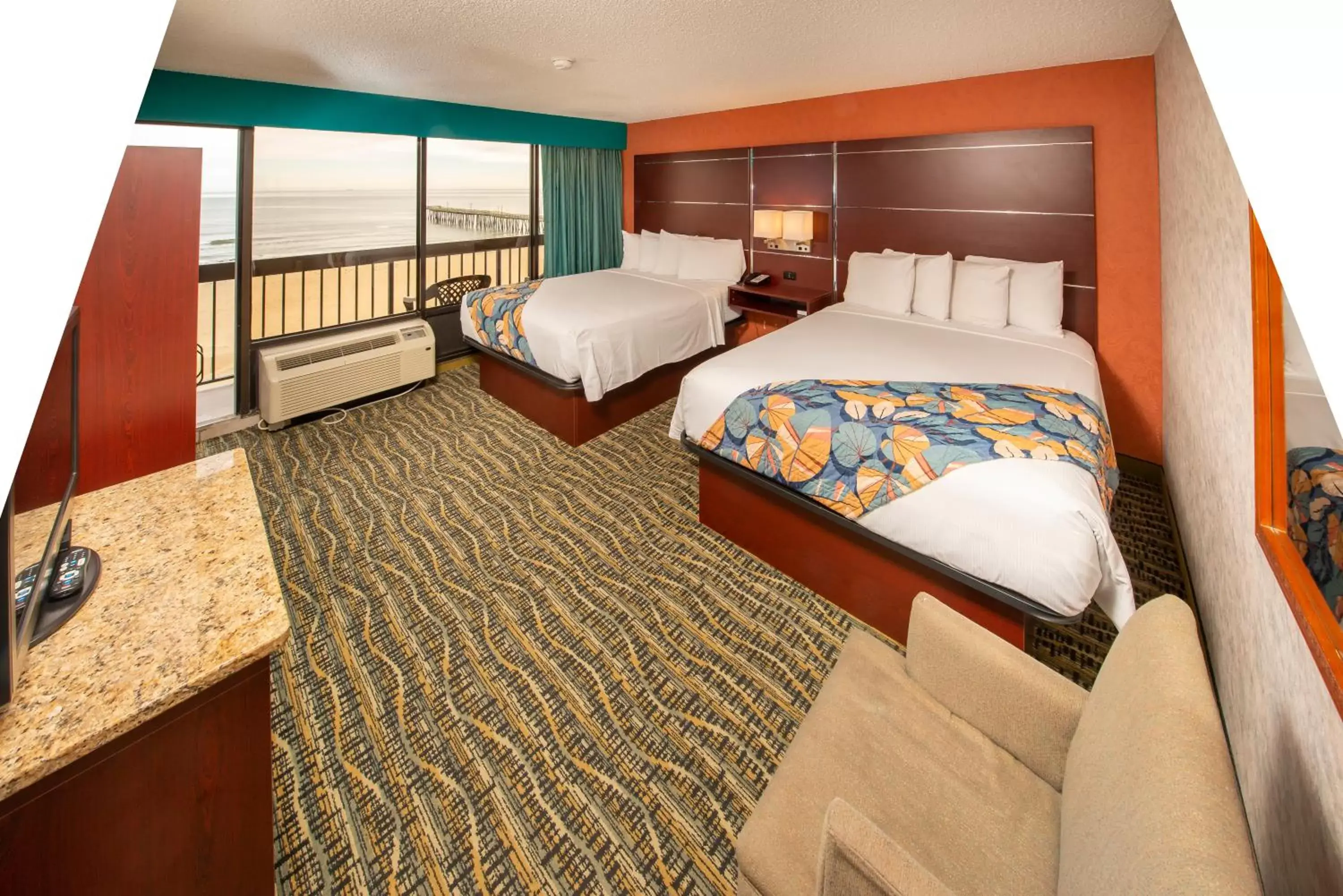 Bed in The Breakers Resort Inn