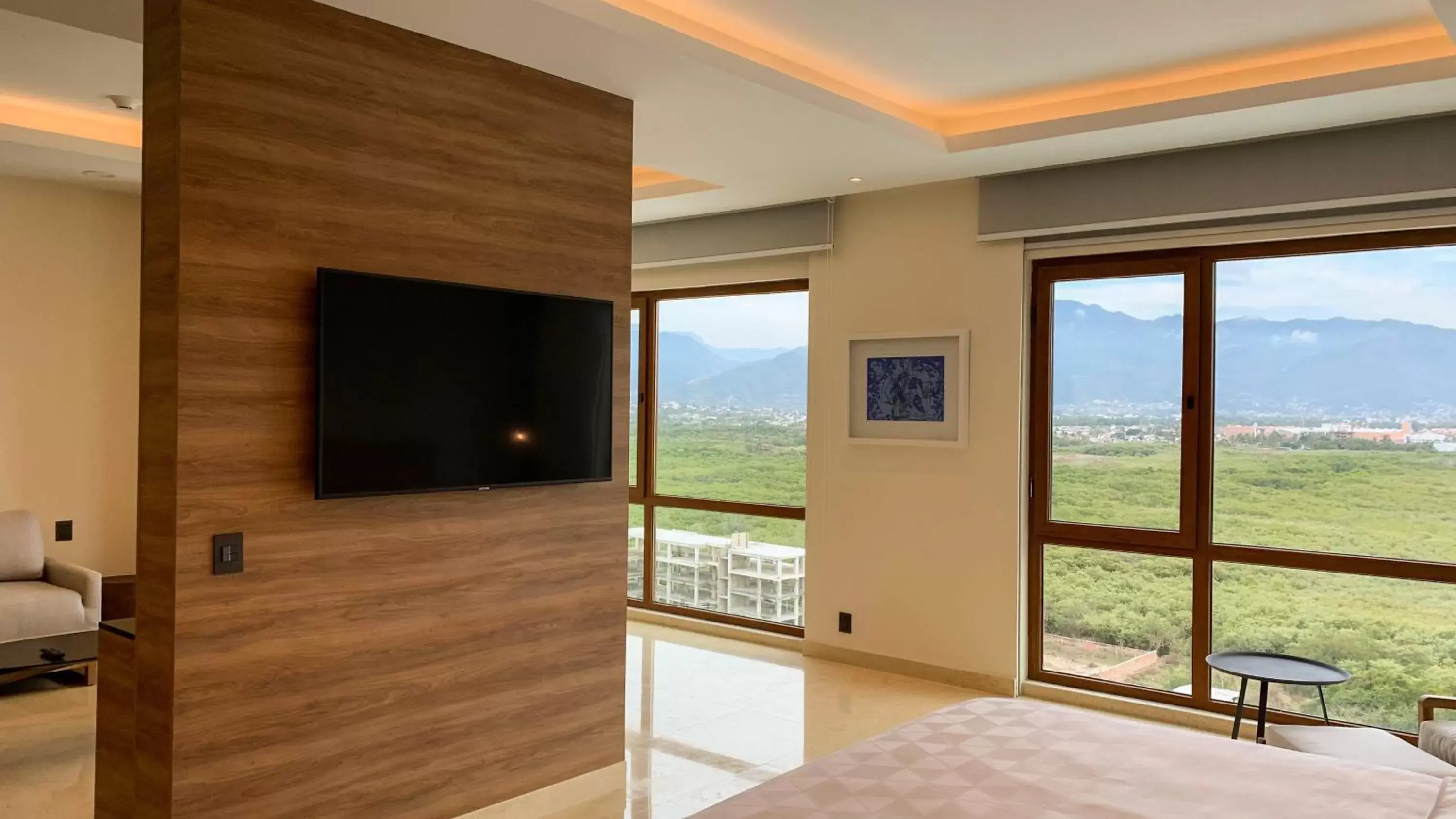 Photo of the whole room, TV/Entertainment Center in Holiday Inn & Suites - Puerto Vallarta Marina & Golf, an IHG Hotel