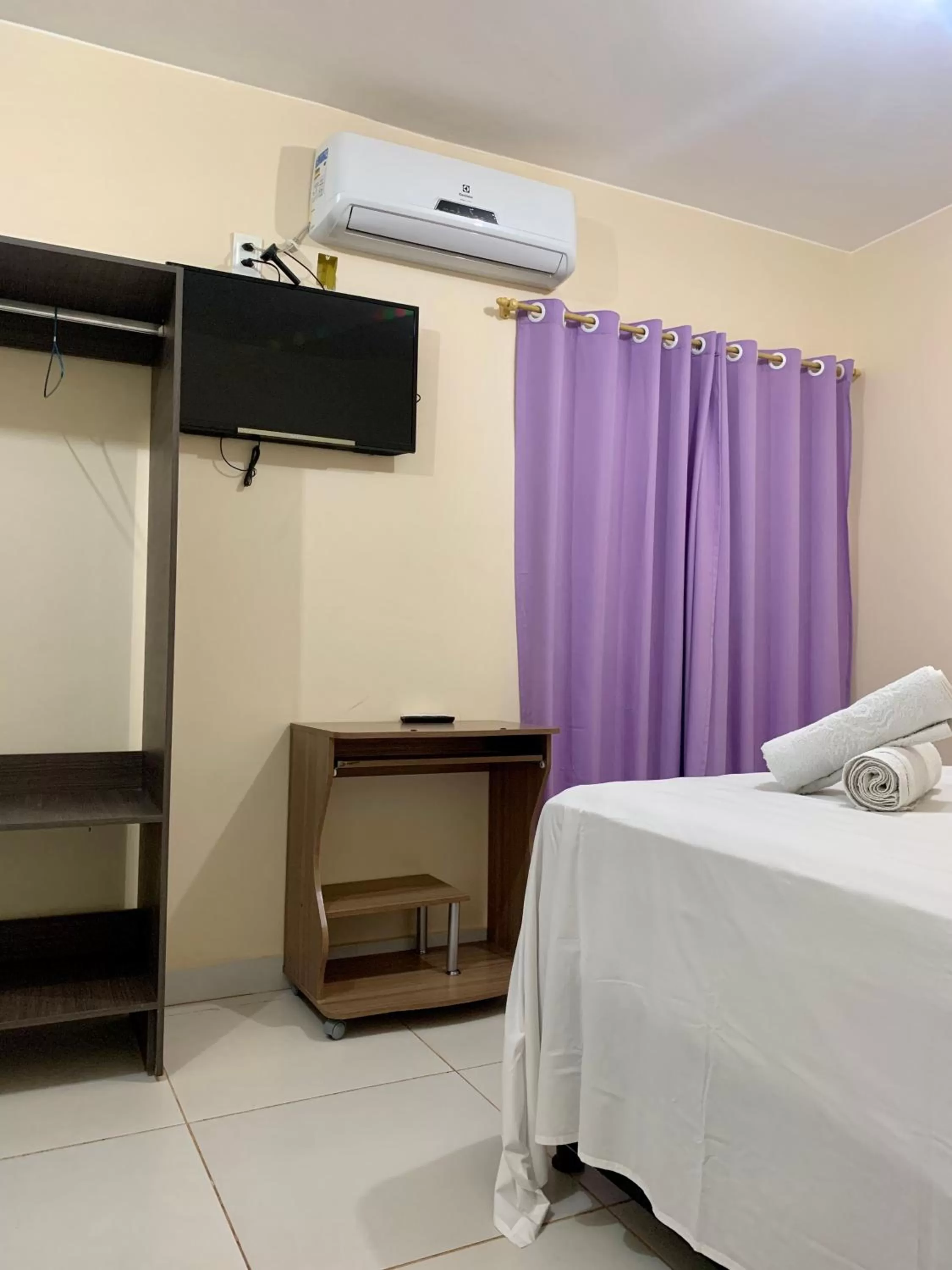 Bed in Pousada Jardim Brasília