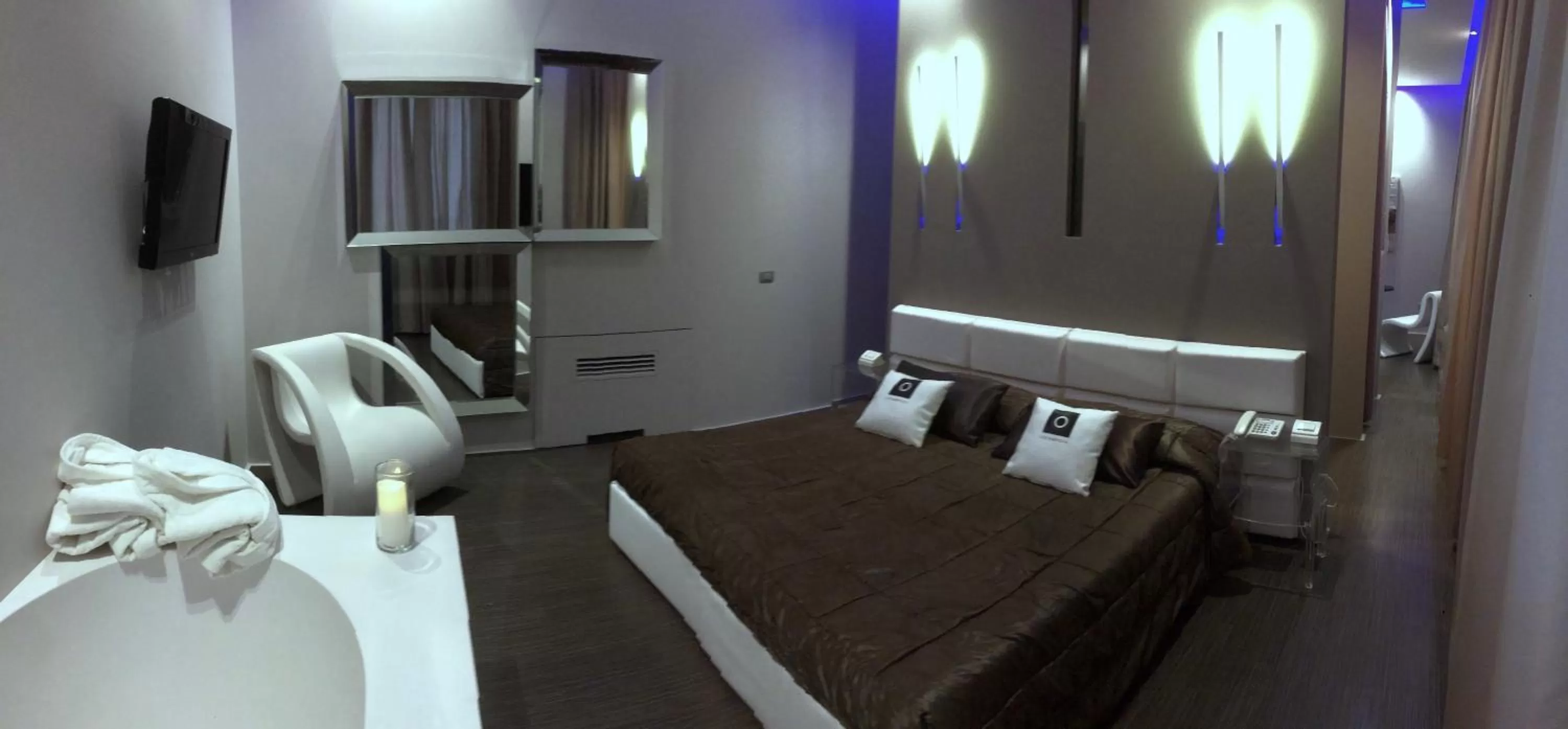 Bed in Le Camp Suite & Spa