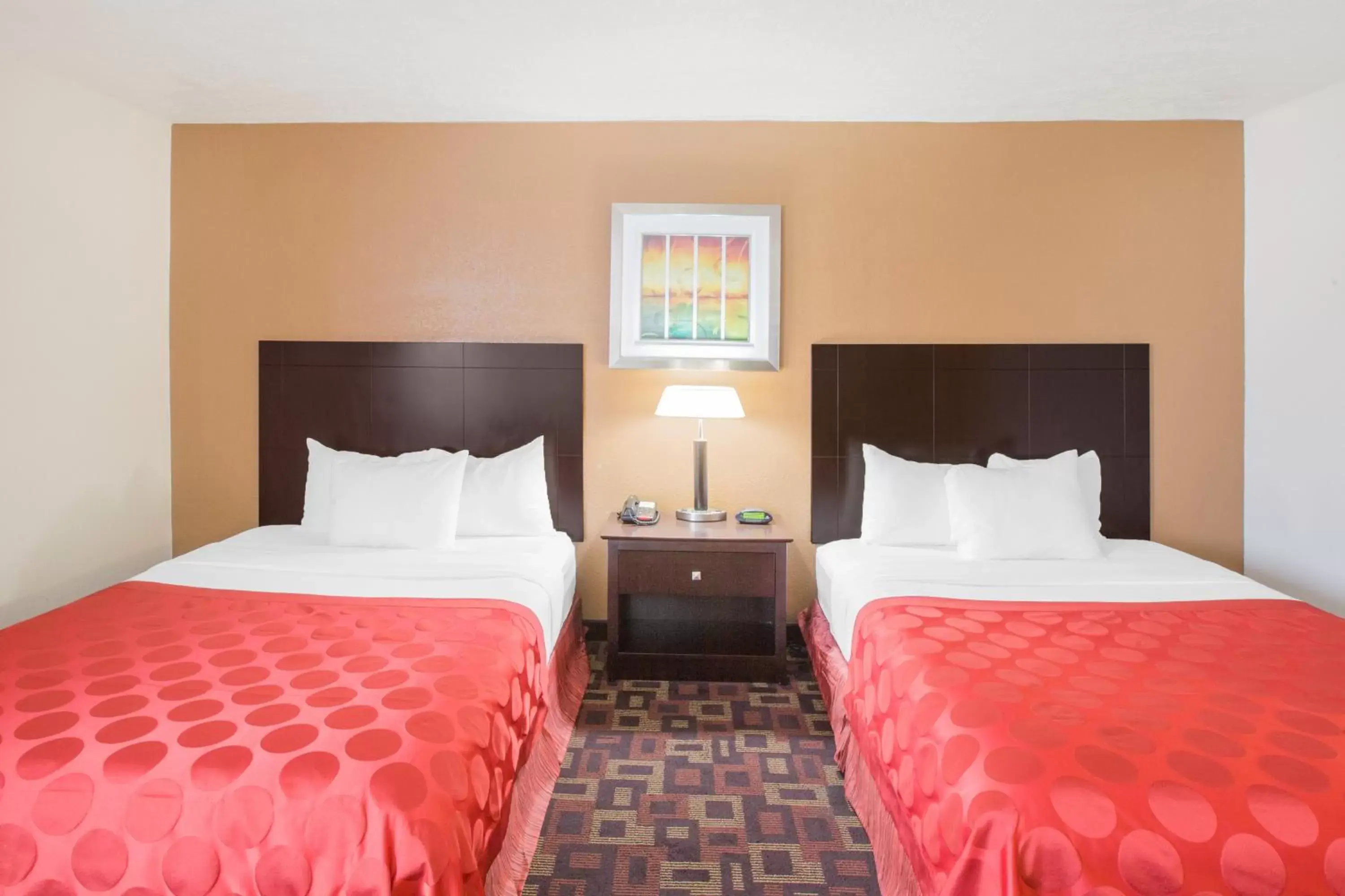 Bed in Ramada by Wyndham Tulsa