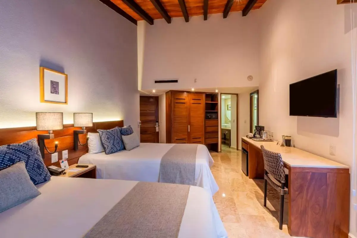 Bedroom, TV/Entertainment Center in Buenaventura Grand Hotel & Great Moments - All Inclusive