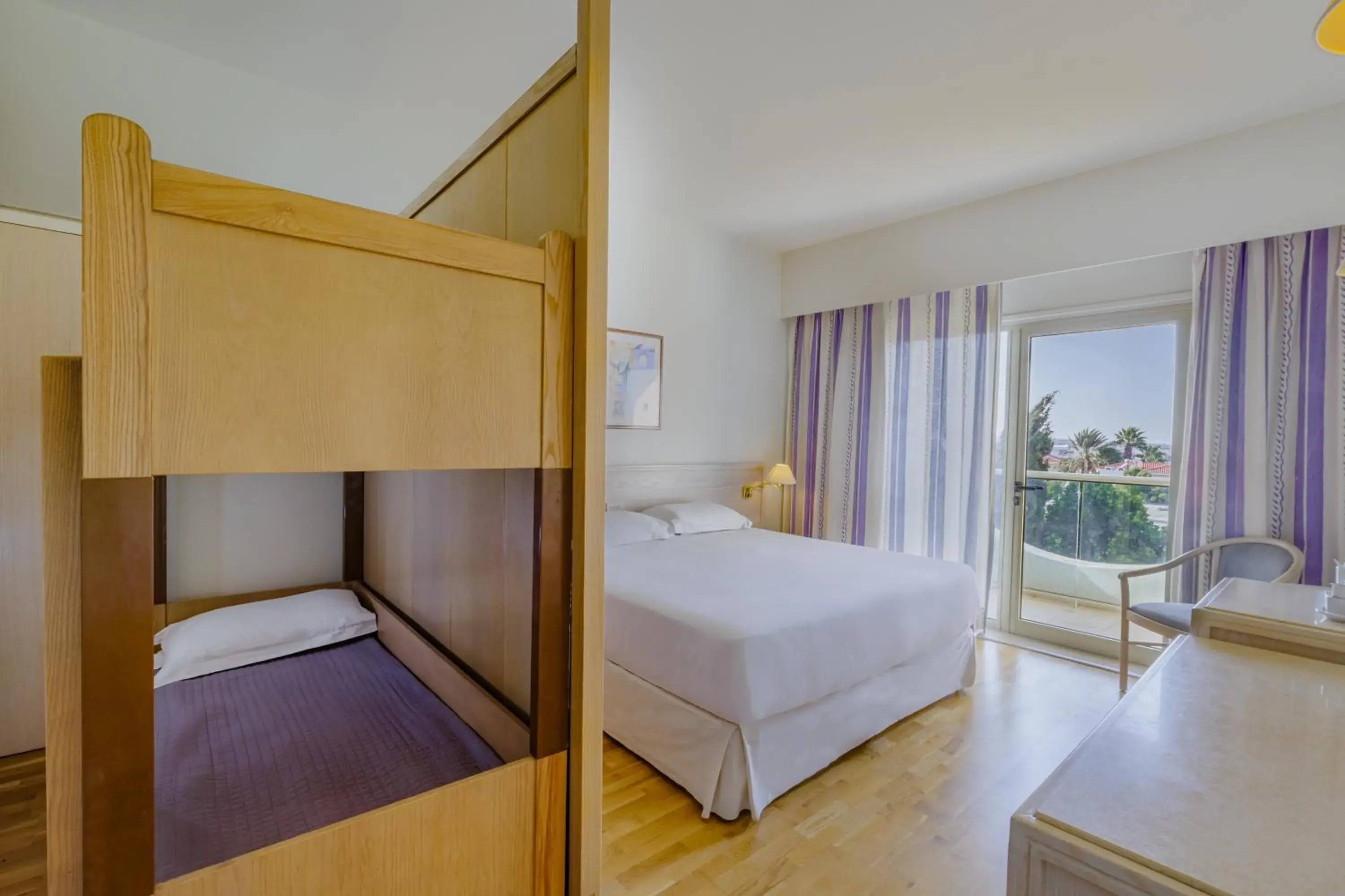 Bedroom in Golden Coast Beach Hotel