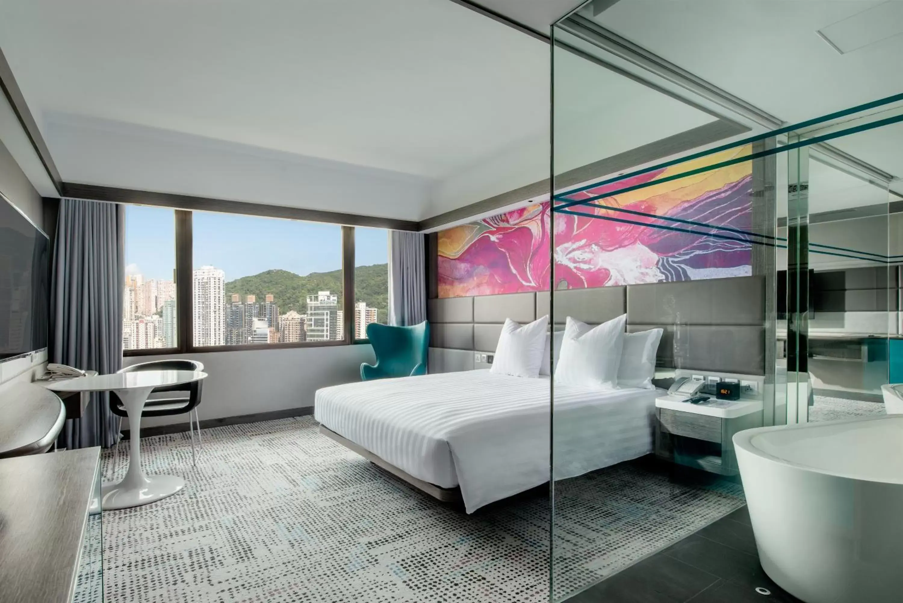 Bedroom in The Park Lane Hong Kong, a Pullman Hotel