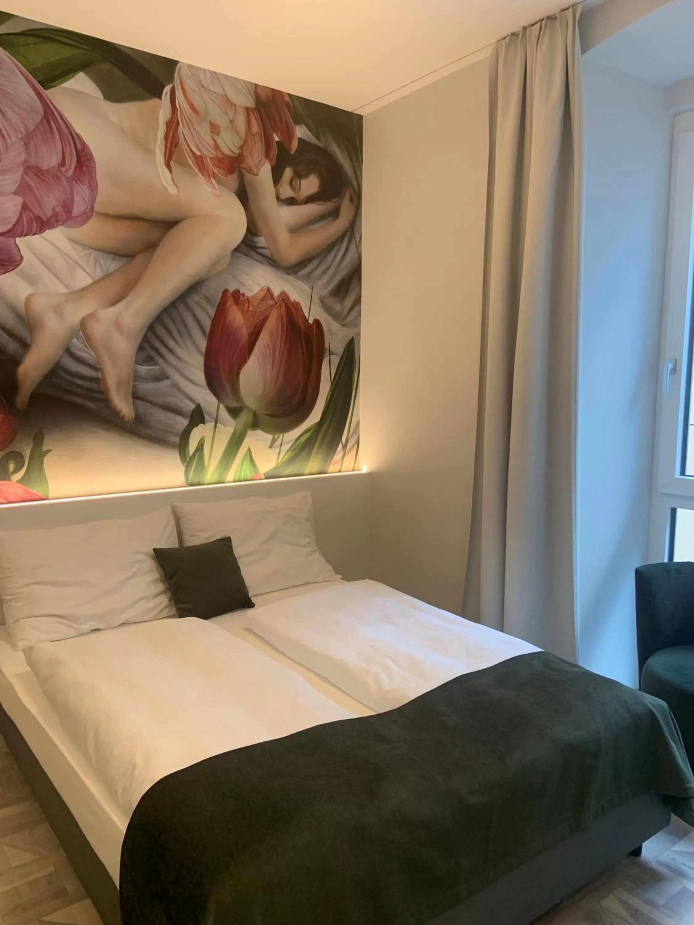 Bed in ART-INN Design Self-Check-in-Hotel