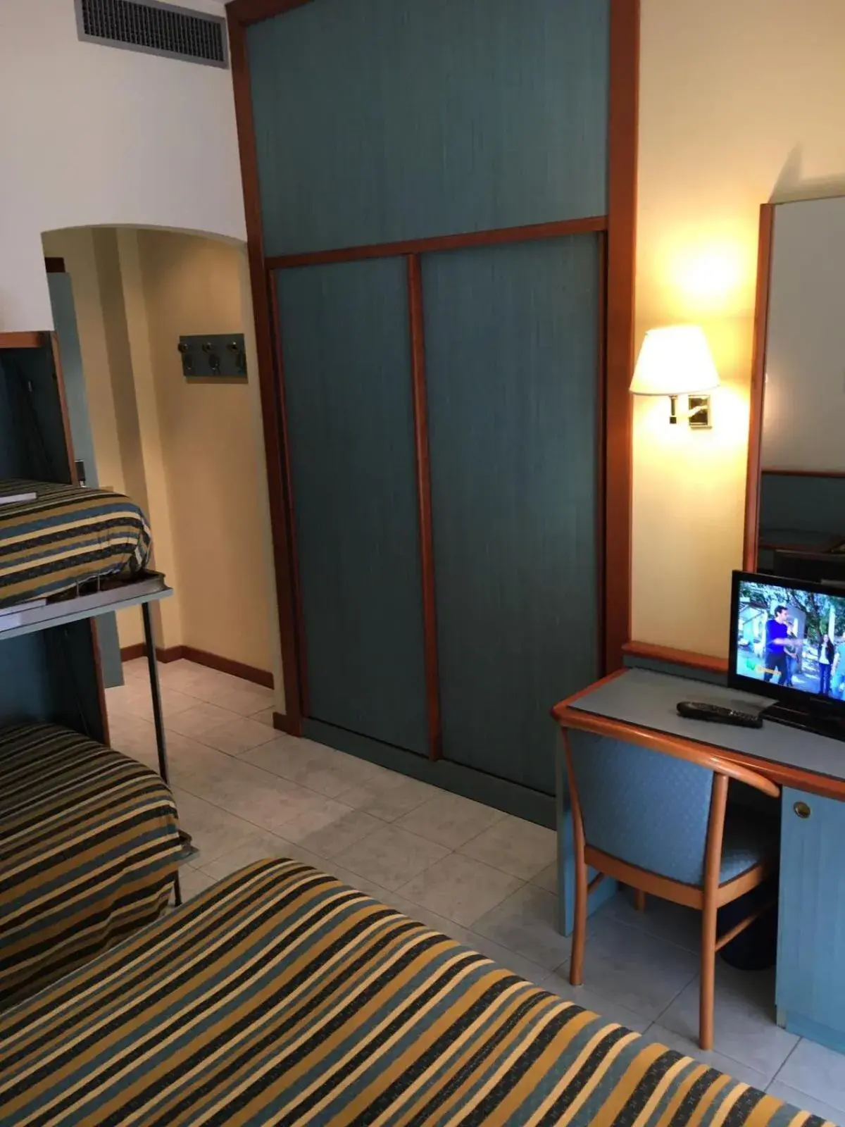 Bedroom, TV/Entertainment Center in Hotel Splendid