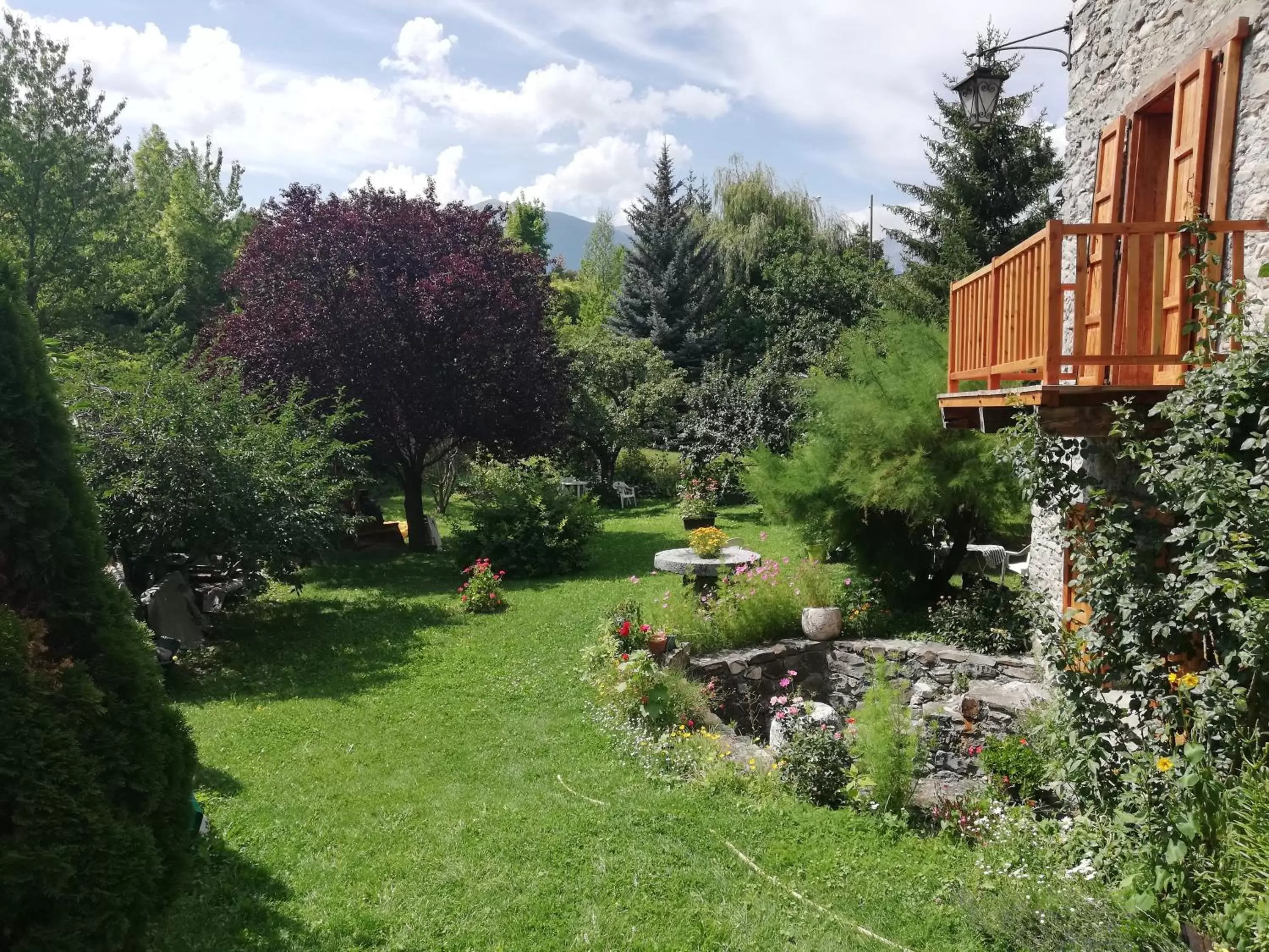 Garden in B&B et Apartments Moulin du Martinet