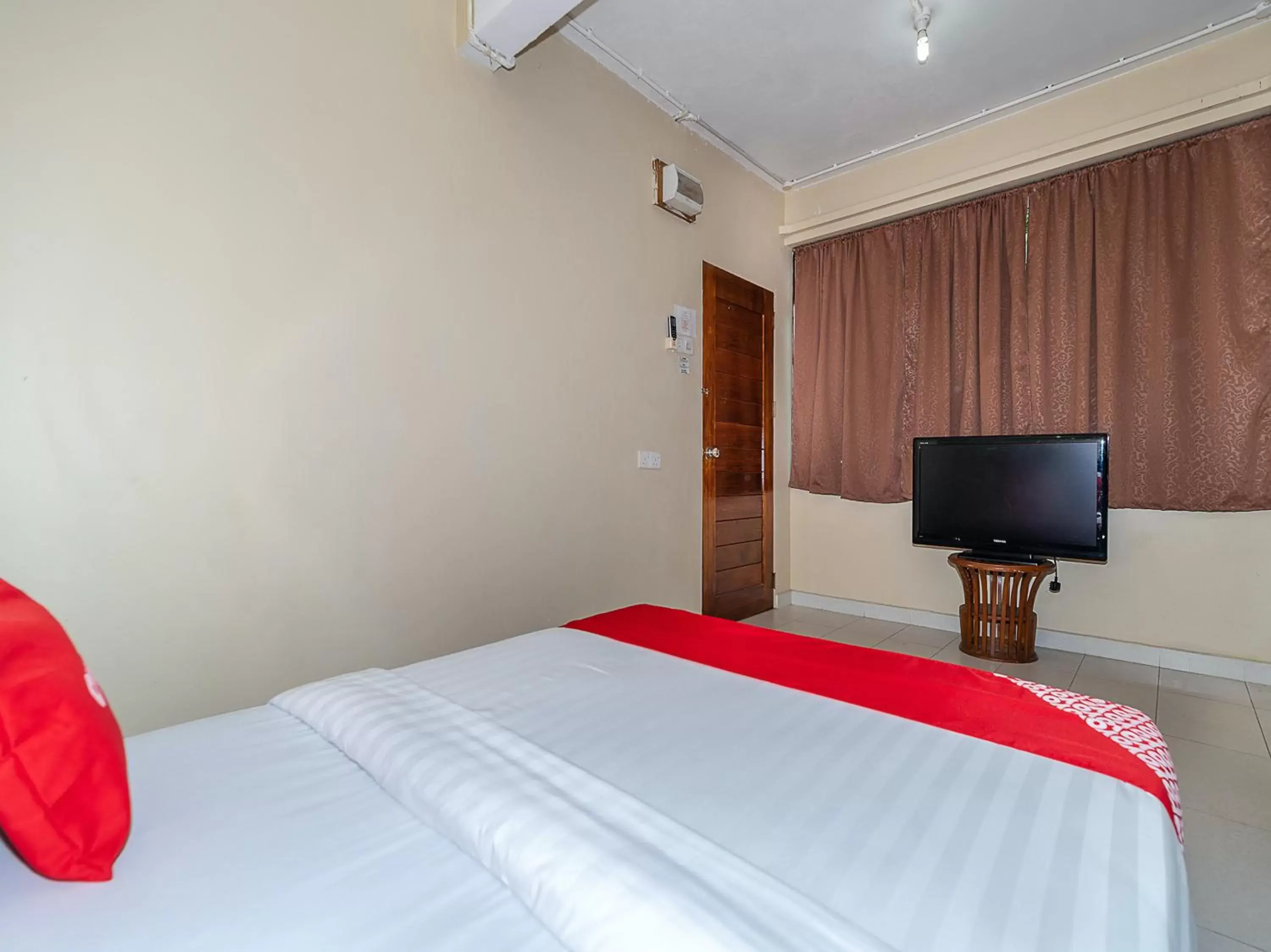 Bed in OYO 89932 Dd Homestay