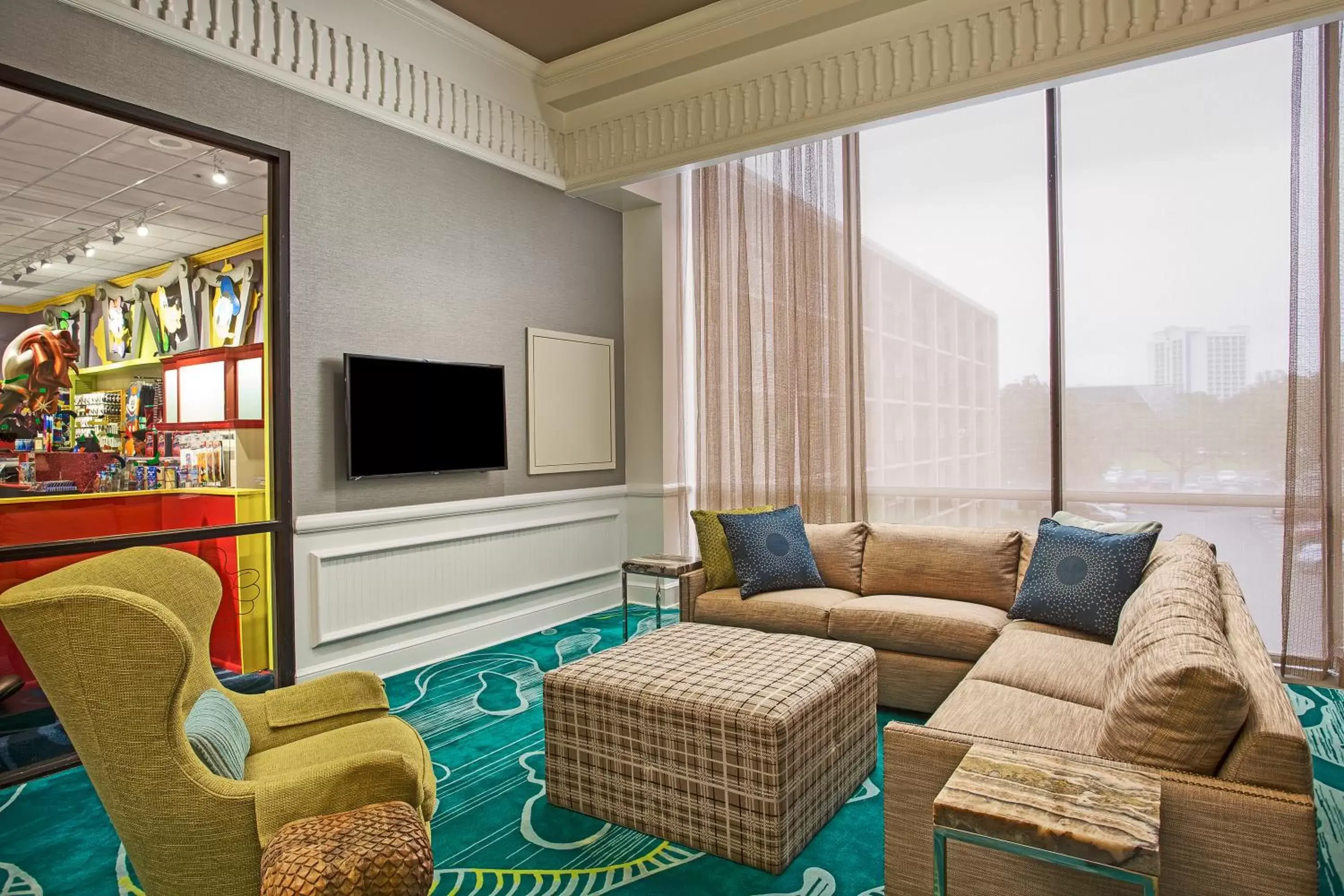 Living room, Seating Area in Wyndham Garden Lake Buena Vista Disney Springs® Resort Area