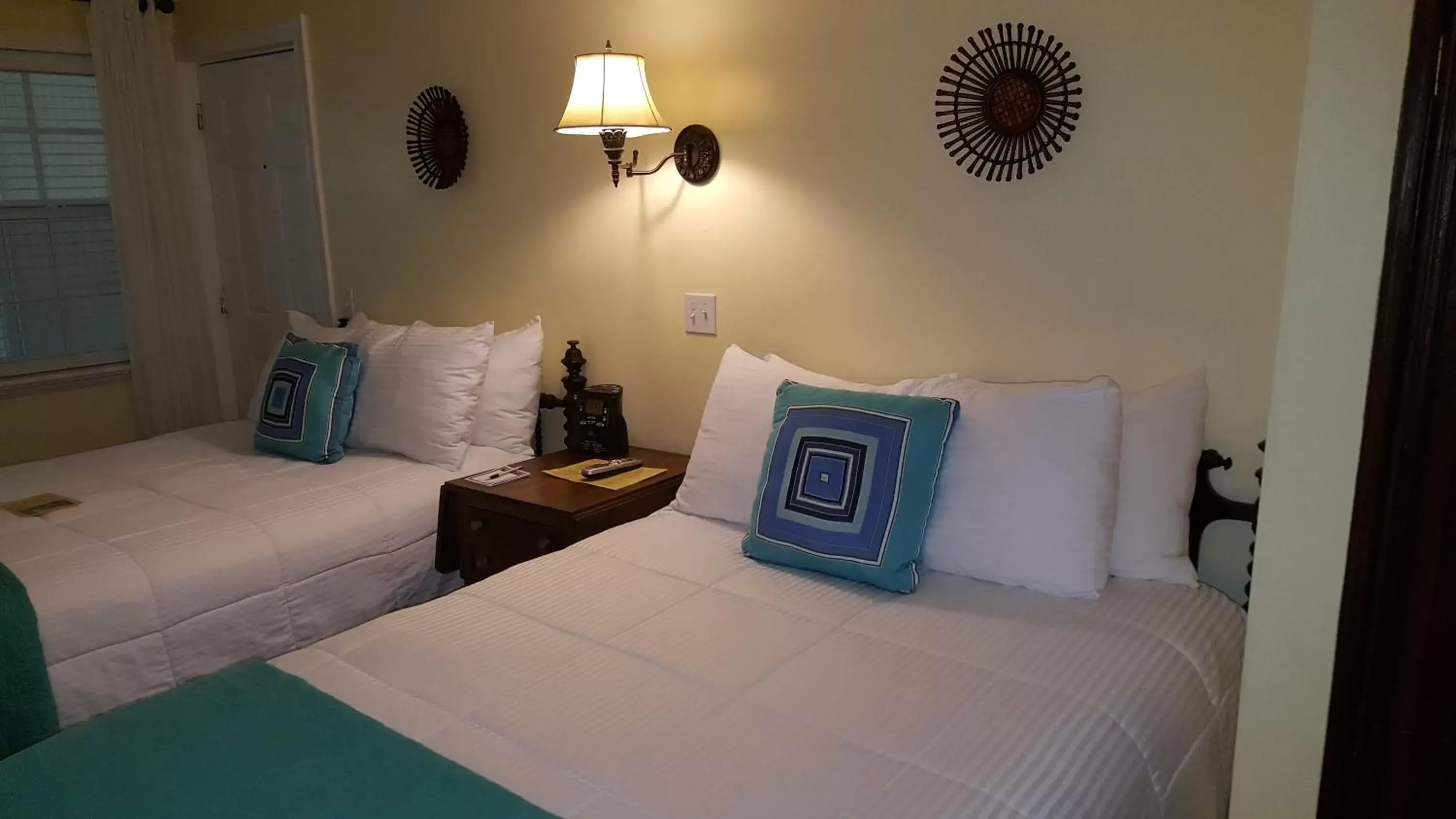Bedroom, Seating Area in The Caribbean Court Boutique Hotel