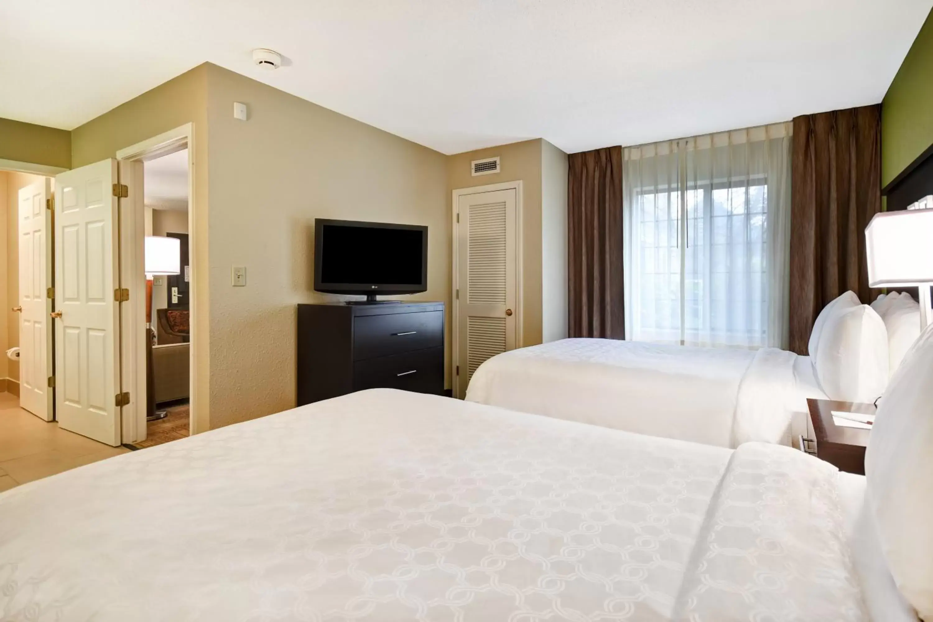 Photo of the whole room, Bed in Staybridge Suites Grand Rapids-Kentwood, an IHG Hotel