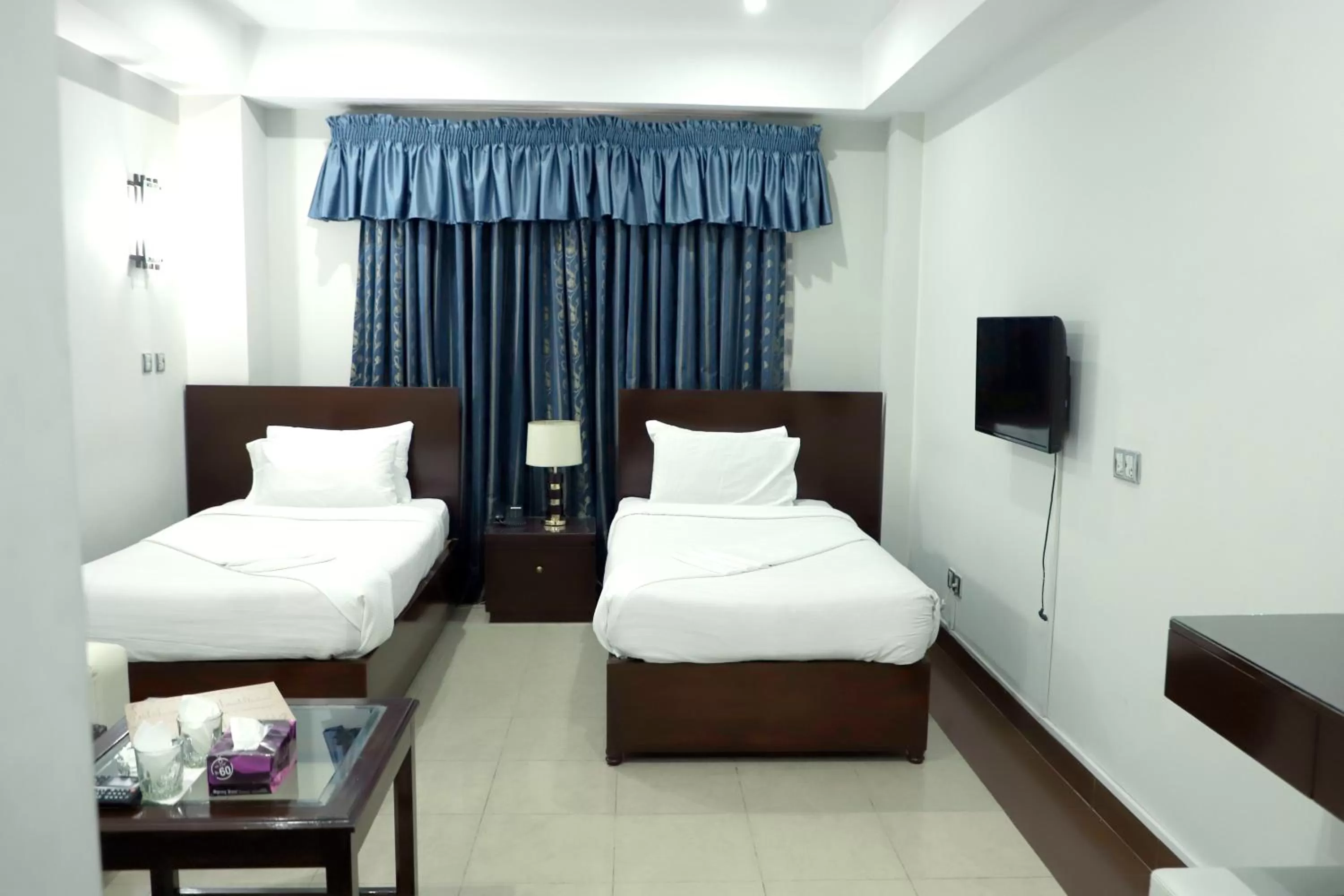 Bed in Hotel Multan Continental