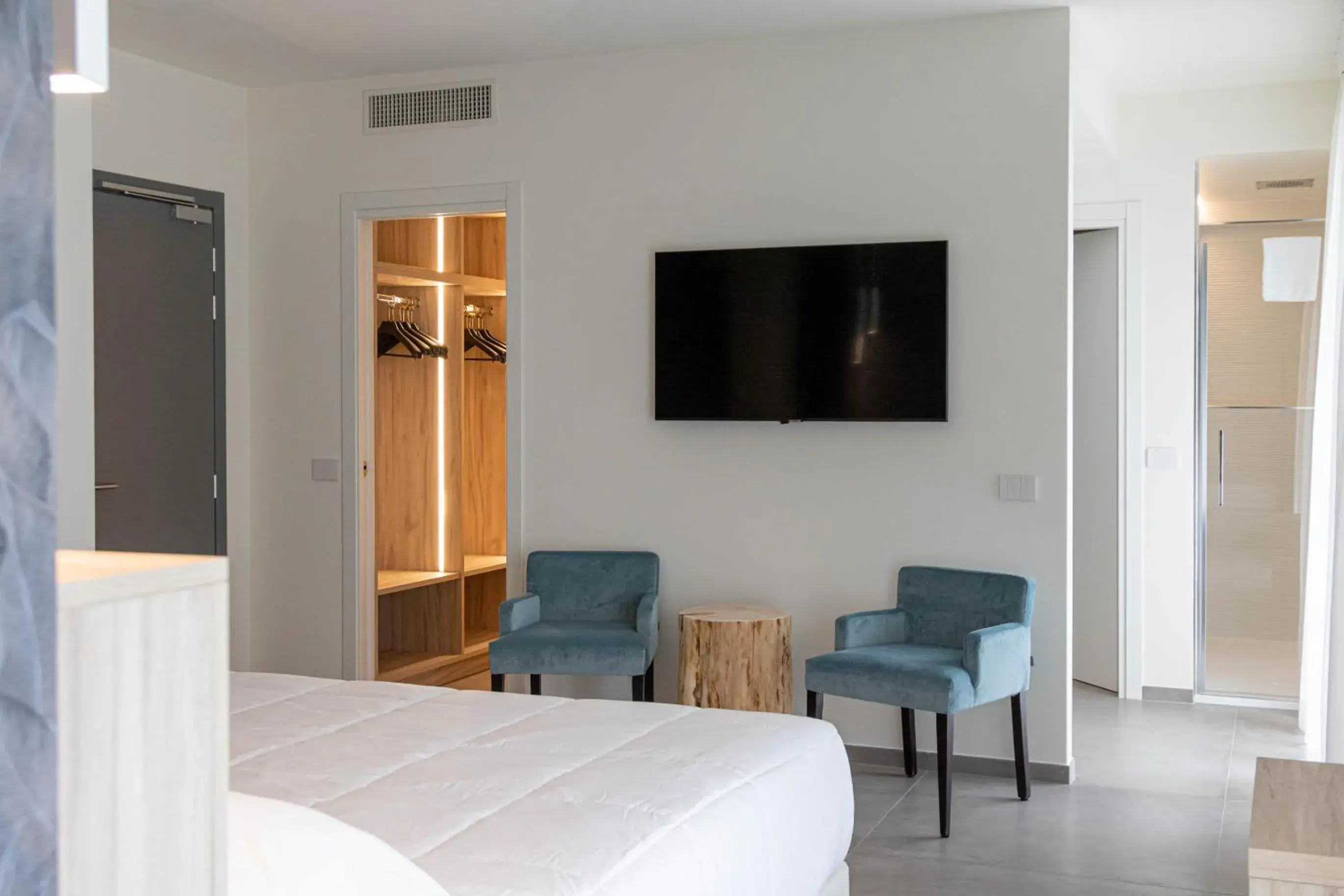 Bedroom, TV/Entertainment Center in Bellettini Hotel