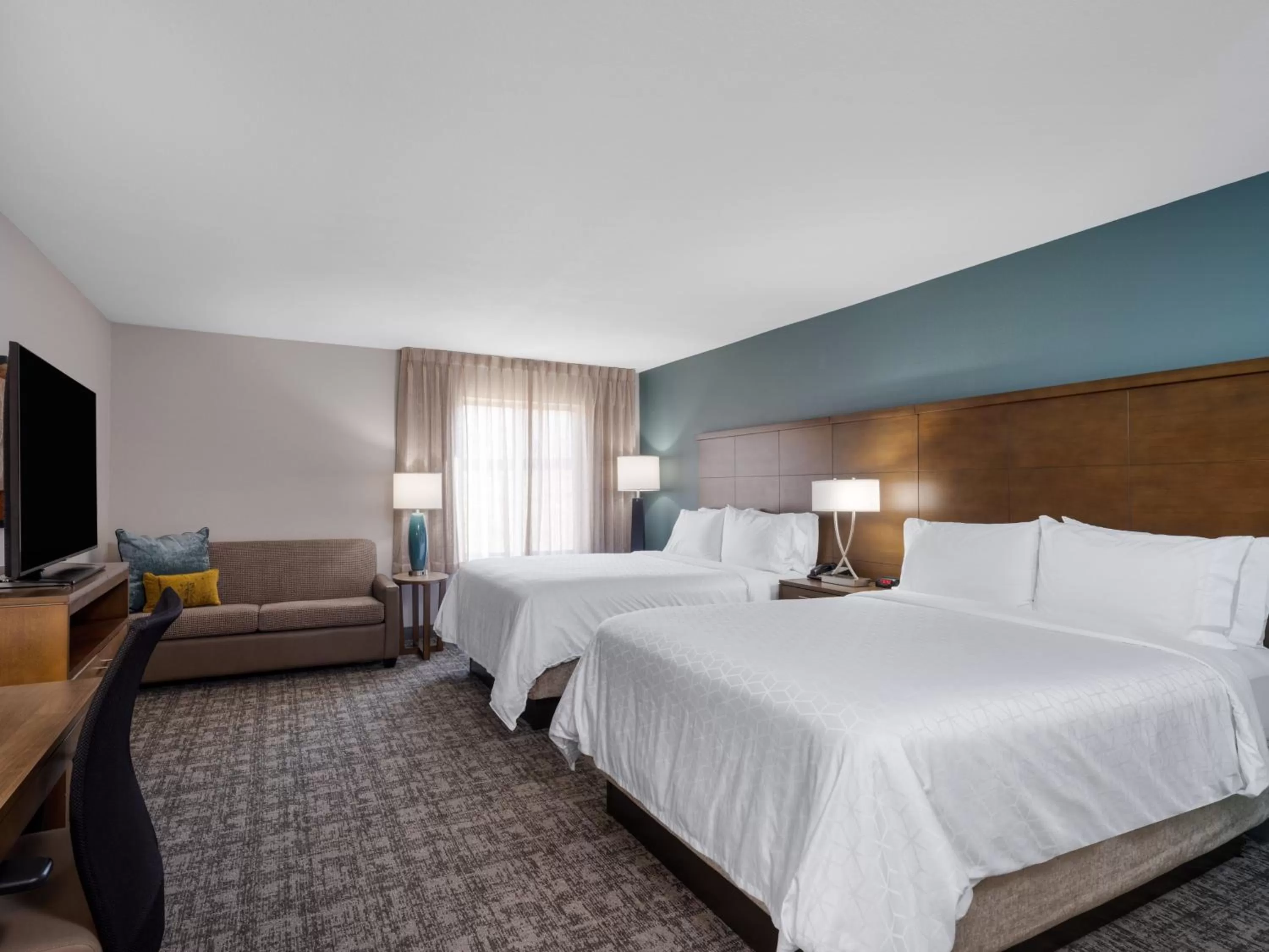Photo of the whole room, Bed in Staybridge Suites - Sioux City Southeast by IHG
