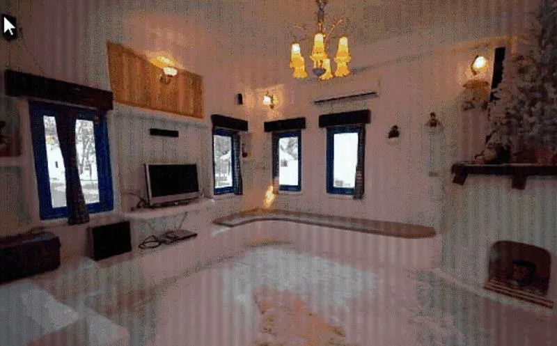 Bed in Scenic Riverside Resort