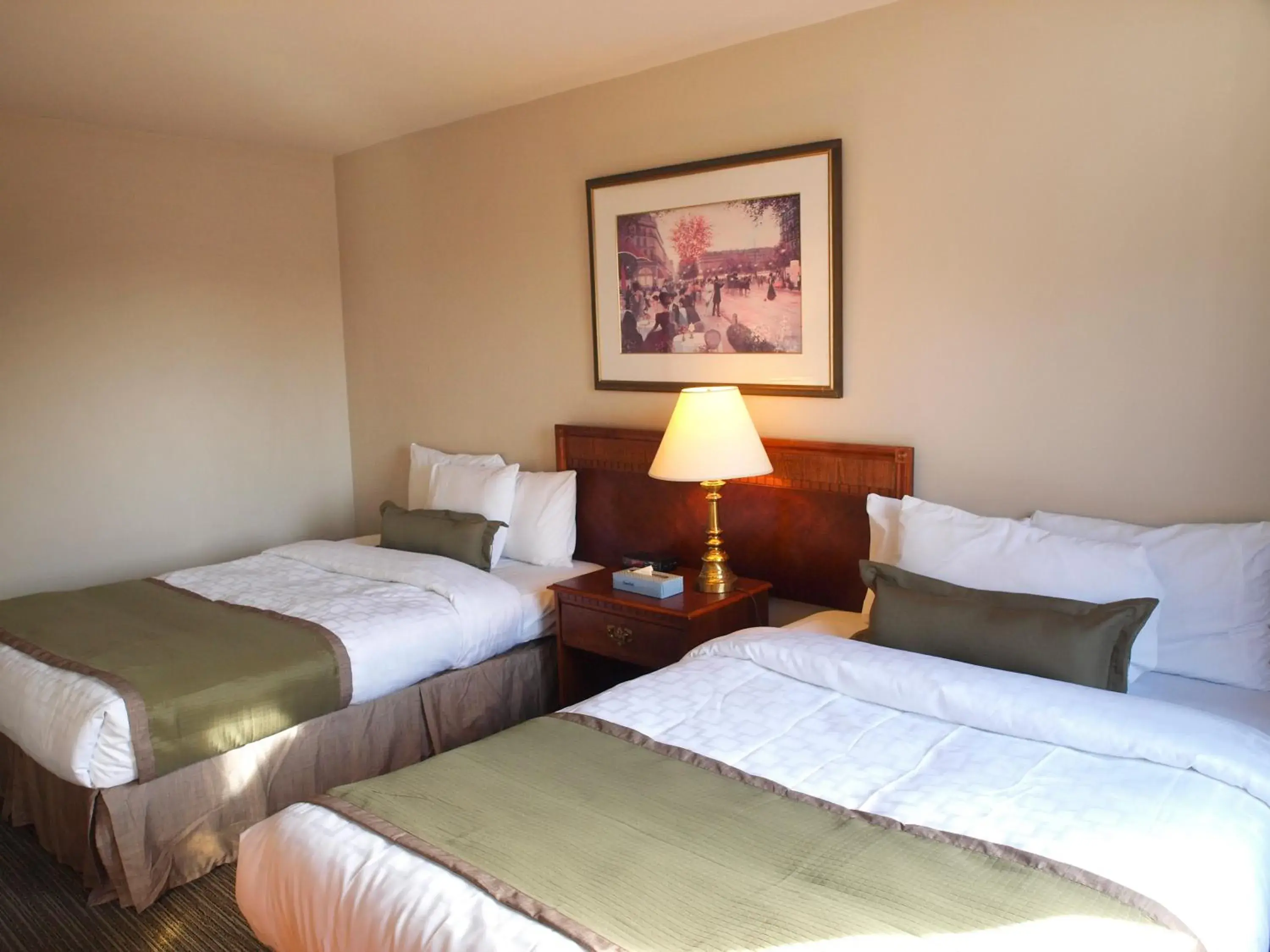 Bed in Beausejour Hotel Apartments/Hotel Dorval