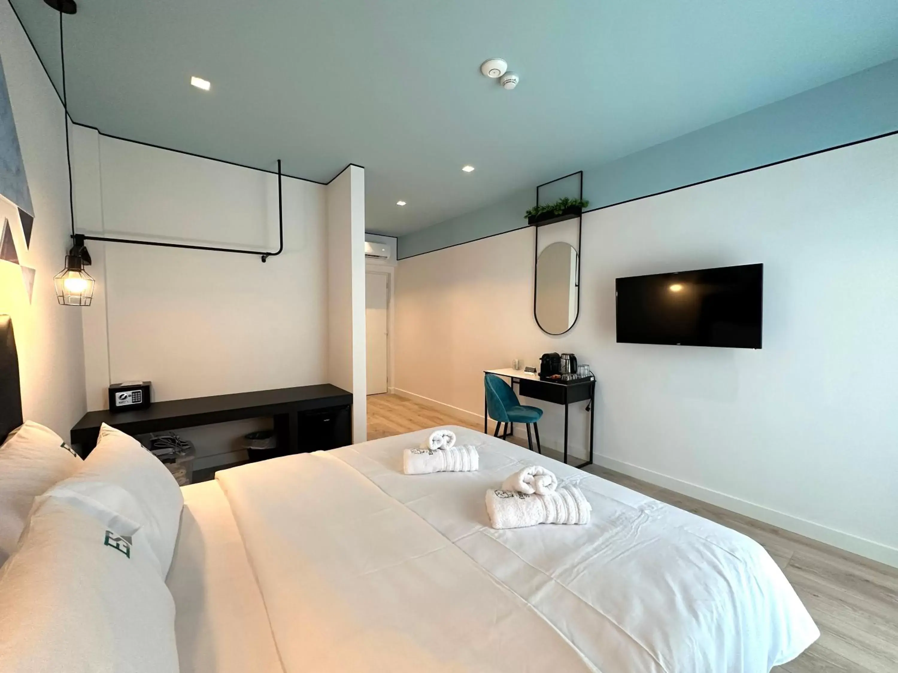 Bed in Urban Elephant Suites