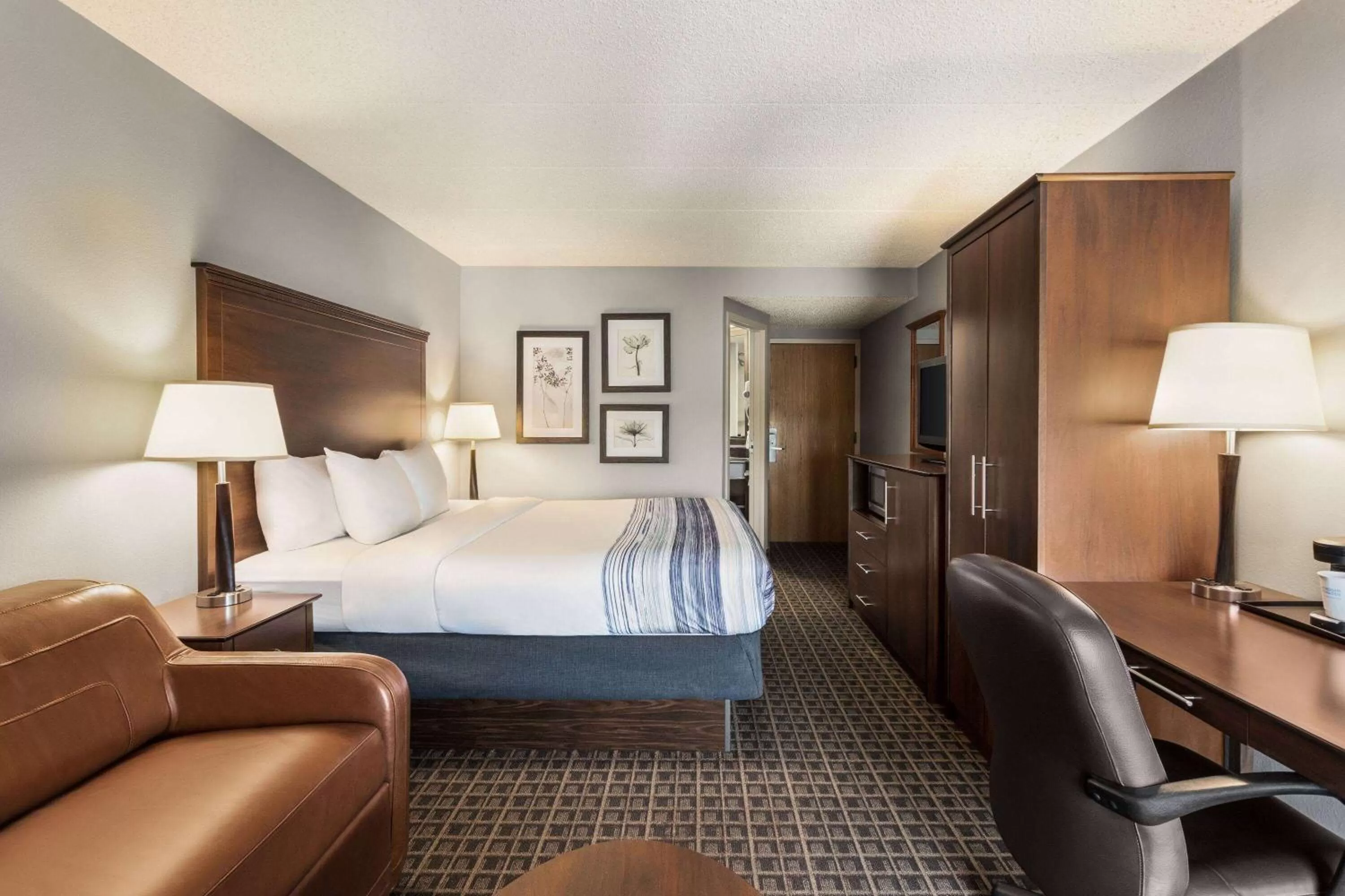 Photo of the whole room, Bed in AmericInn by Wyndham Madison West