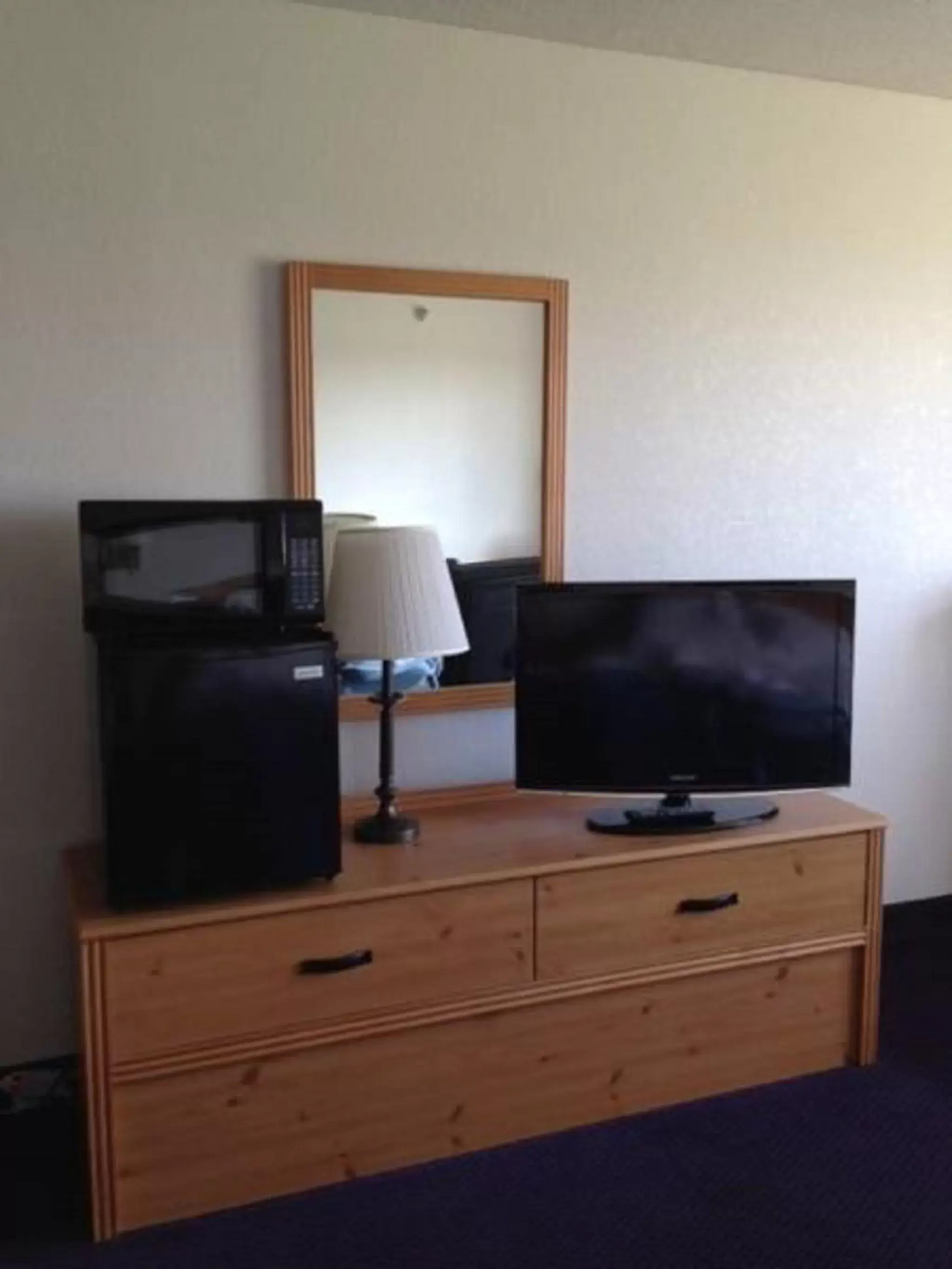 TV and multimedia, TV/Entertainment Center in Super 8 by Wyndham St. James