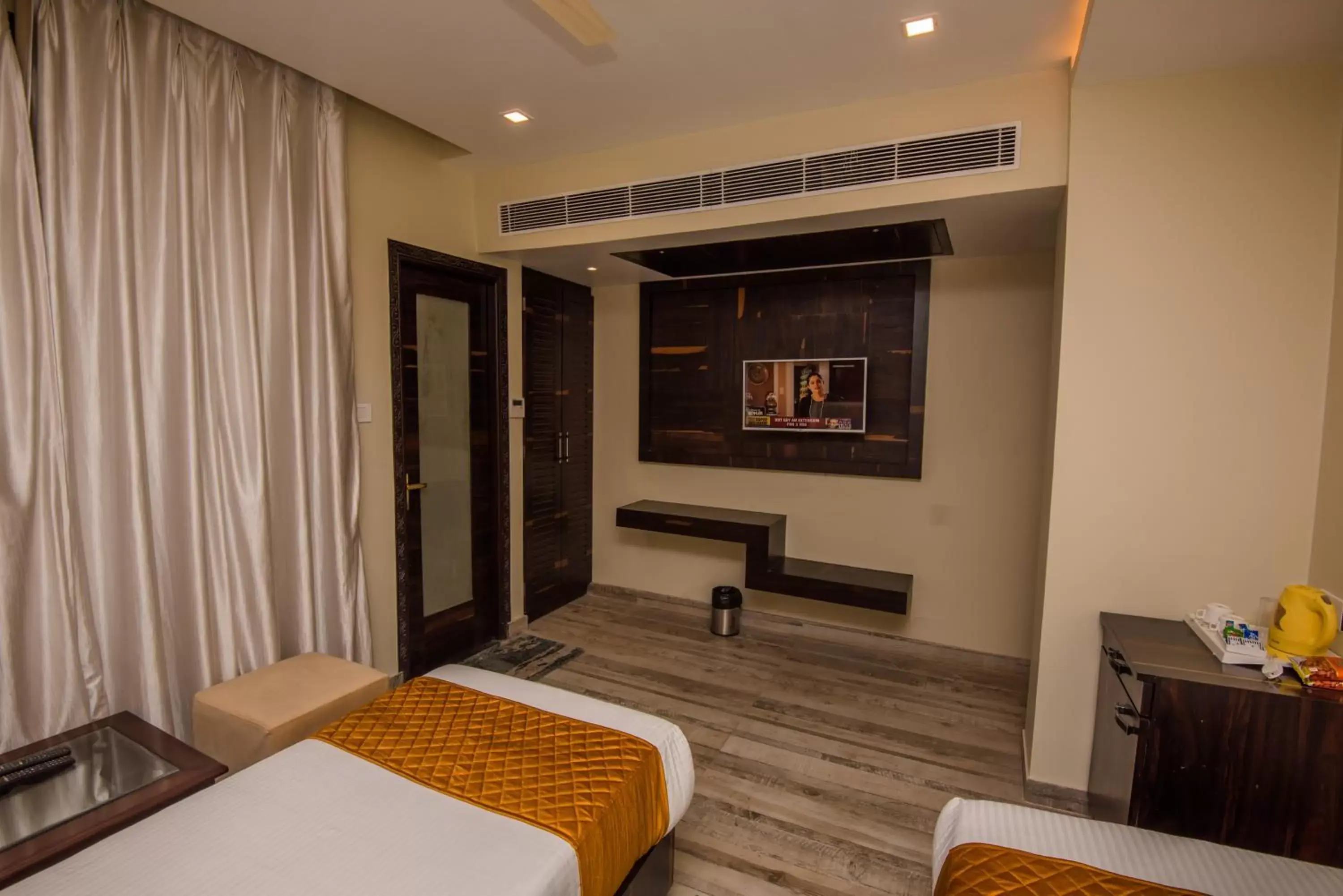 Bedroom, TV/Entertainment Center in Hotel Heritage Inn at Assi Ghat
