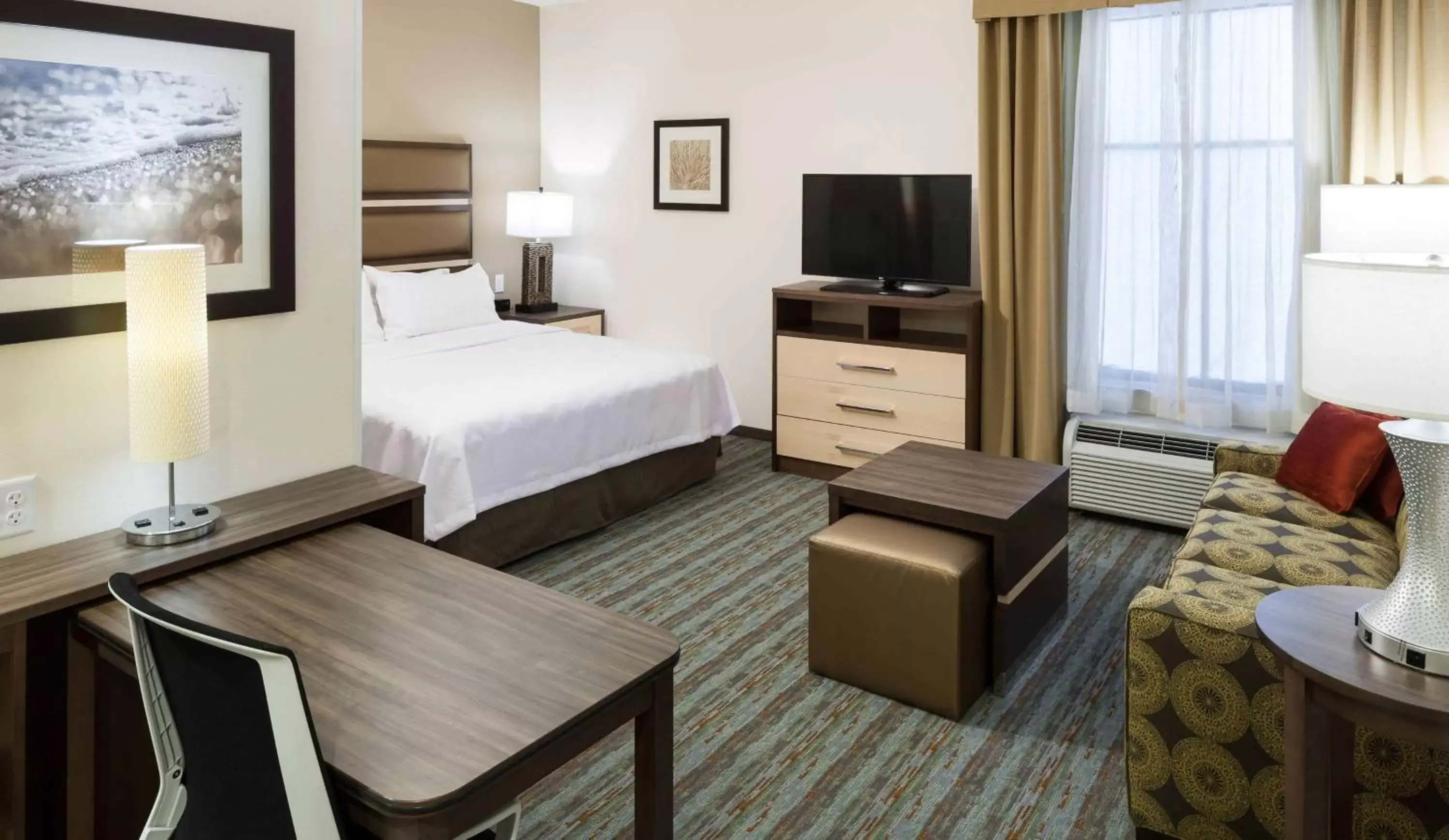 Bed, TV/Entertainment Center in Homewood Suites by Hilton Cape Canaveral-Cocoa Beach