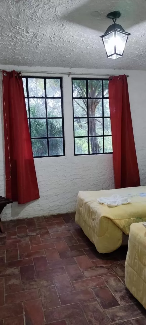 Bed in Posada Montaña del Quetzal