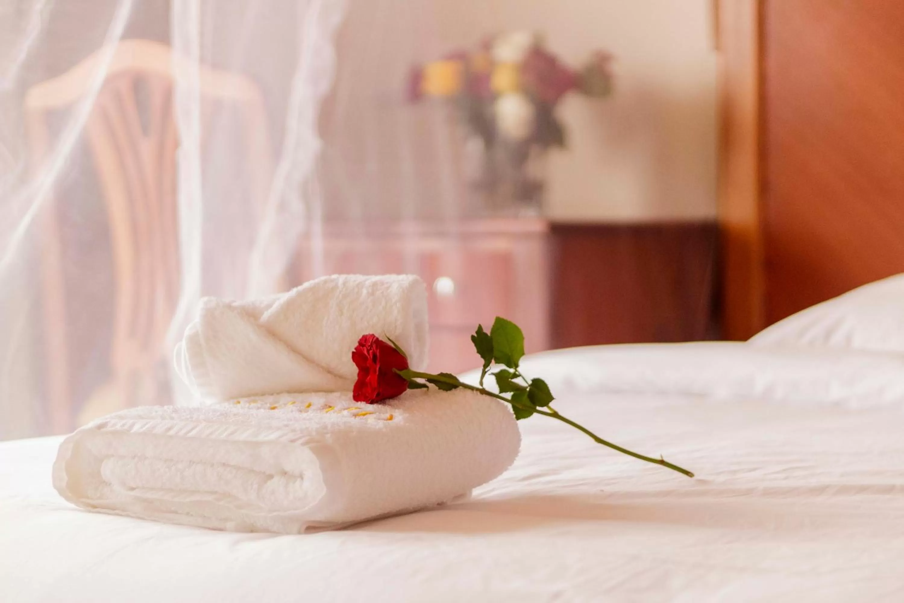 Bed in Hotel Duomo and Suites