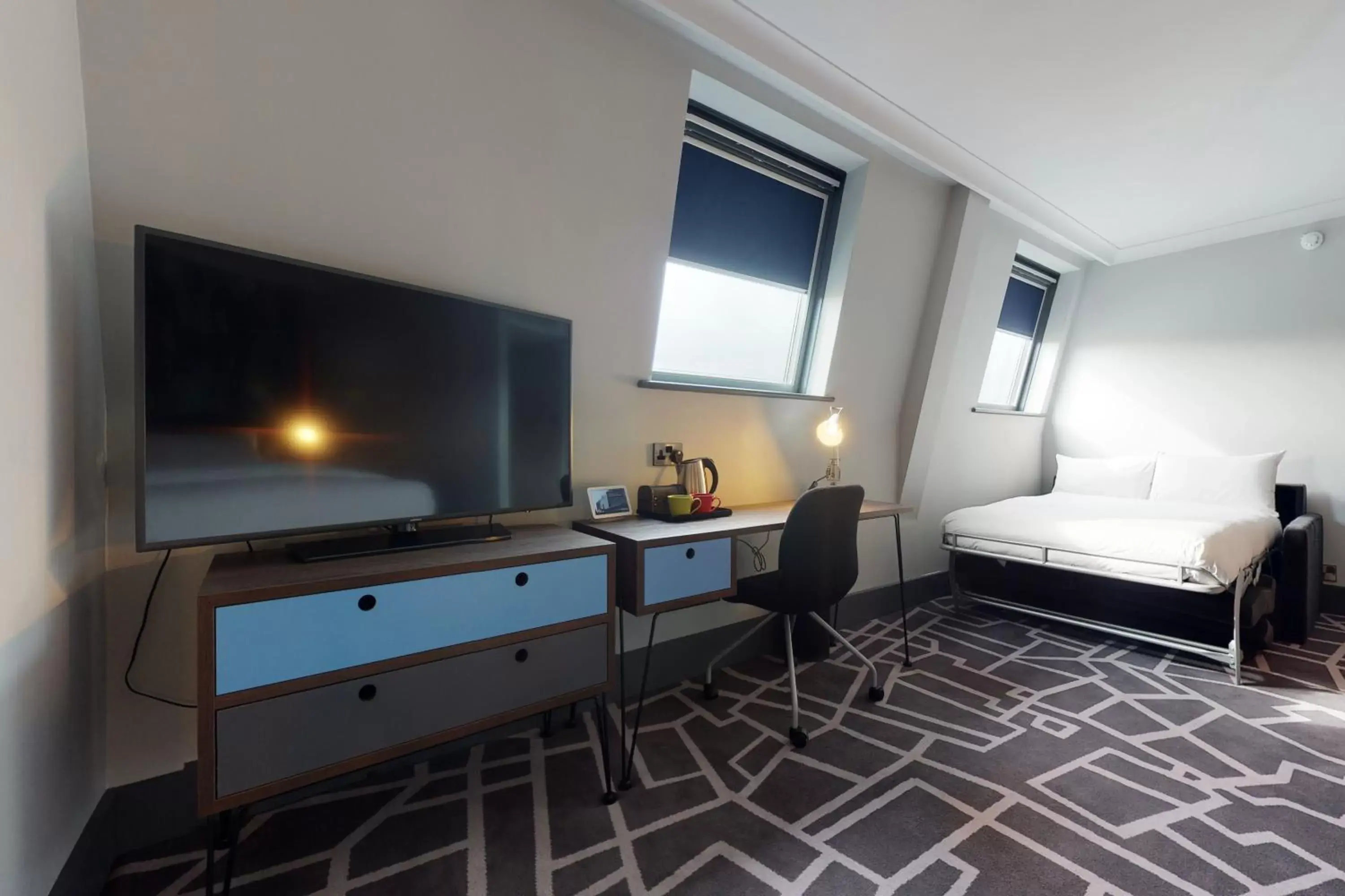 Bedroom, TV/Entertainment Center in Village Hotel Bracknell