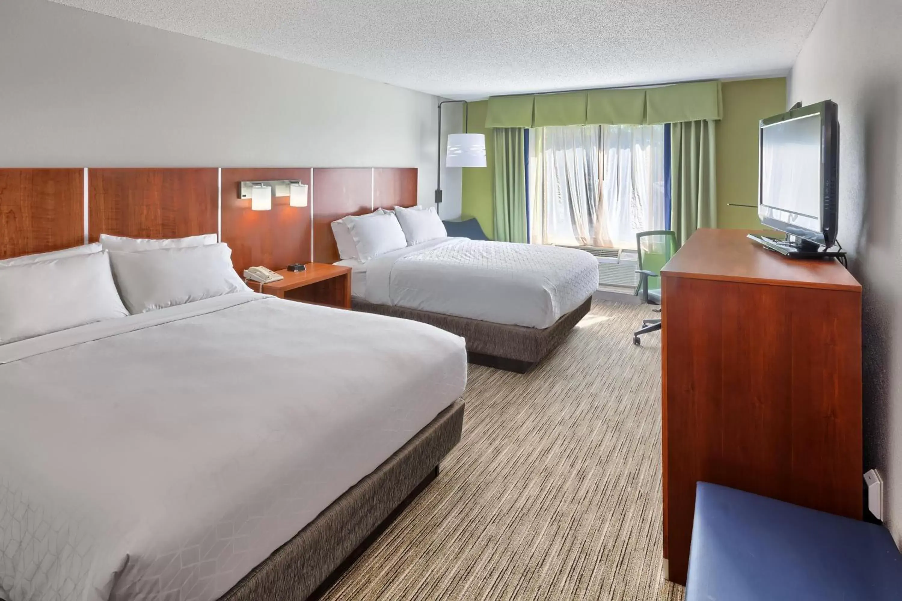 Bed in Holiday Inn Express Hotel & Suites Raleigh North - Wake Forest, an IHG Hotel