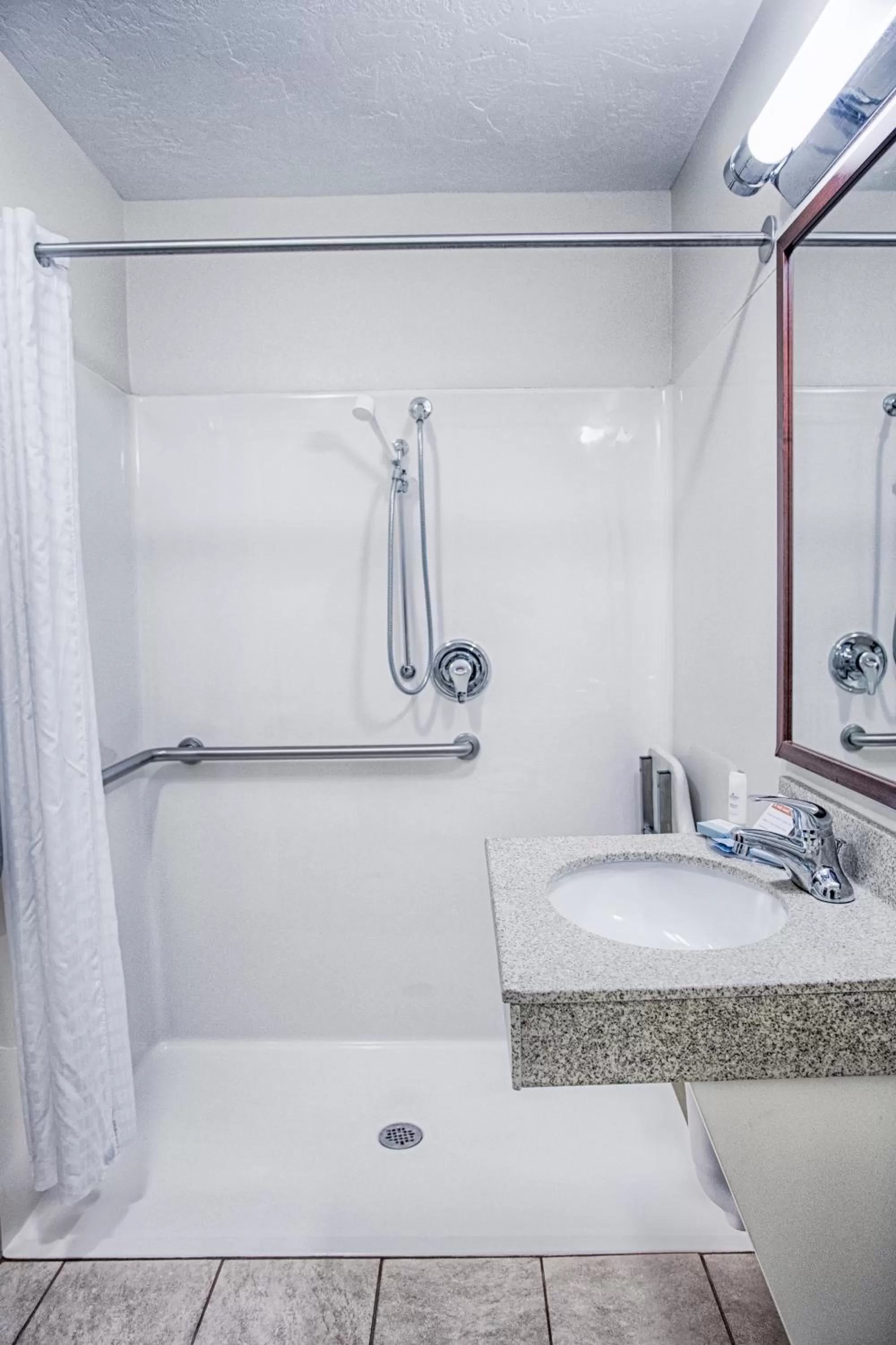 Shower in Candlewood Suites Fargo-North Dakota State University by IHG