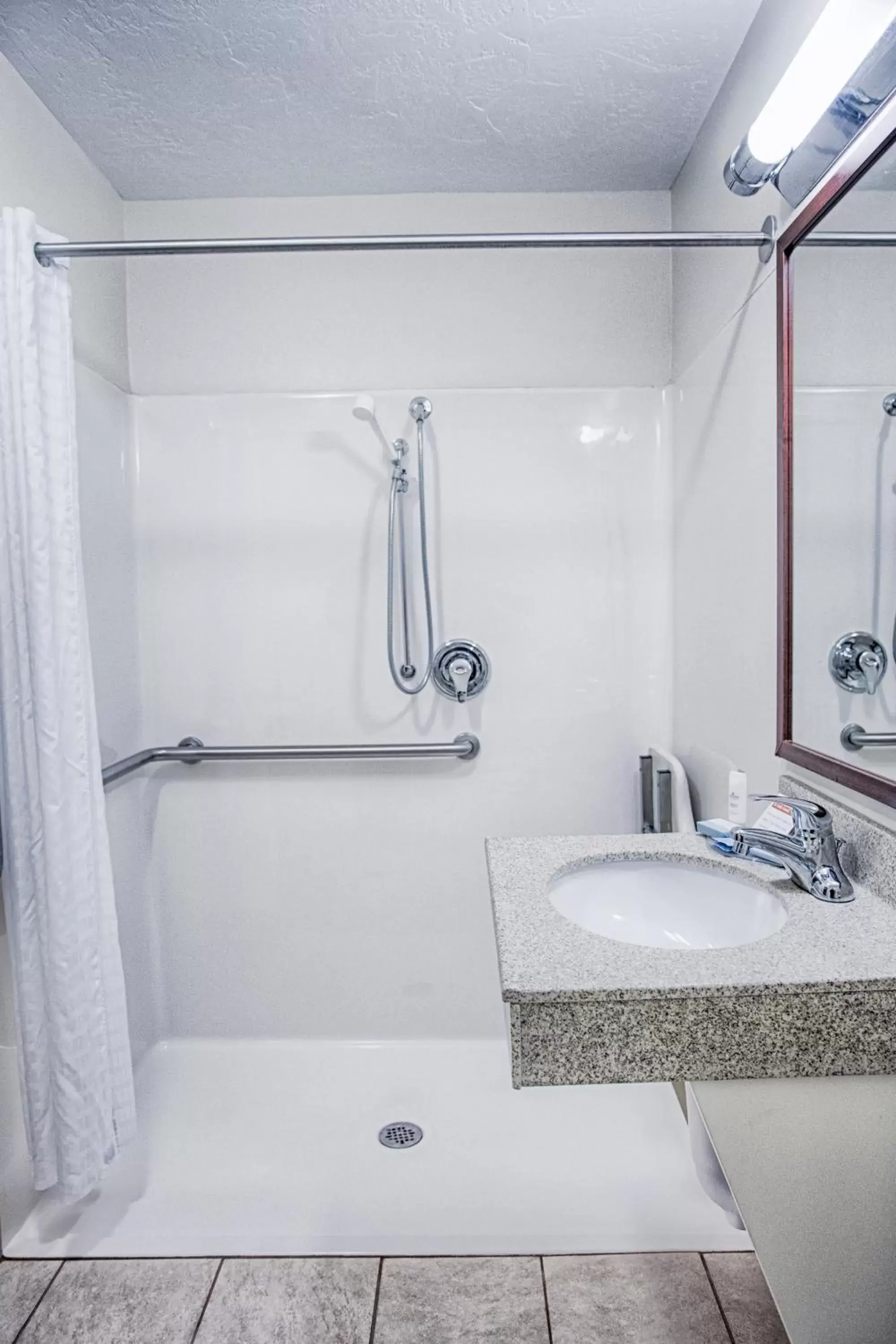 Shower, Bathroom in Candlewood Suites Fargo-North Dakota State University, an IHG Hotel