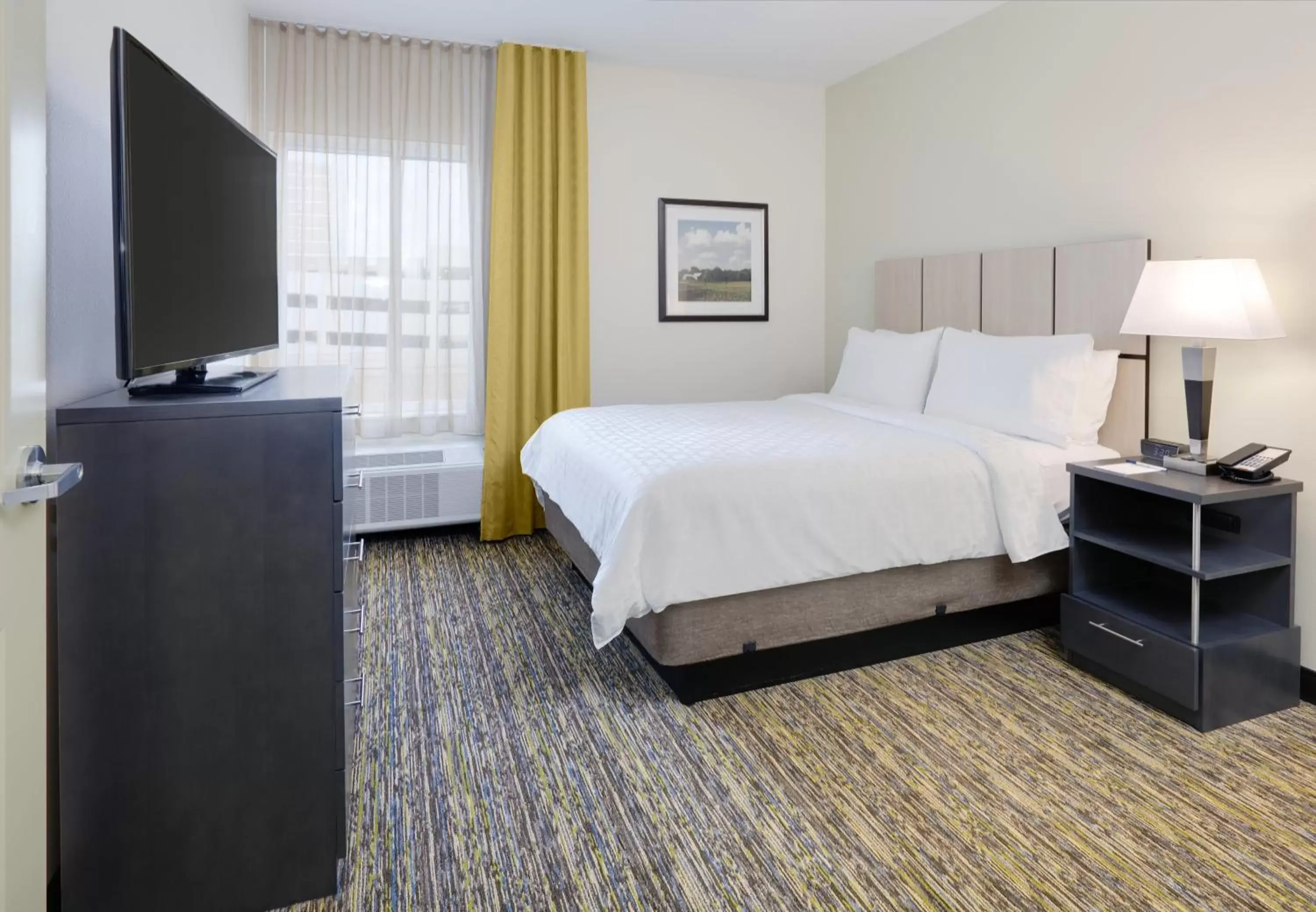 Photo of the whole room, Bed in Candlewood Suites - Farmers Branch, an IHG Hotel