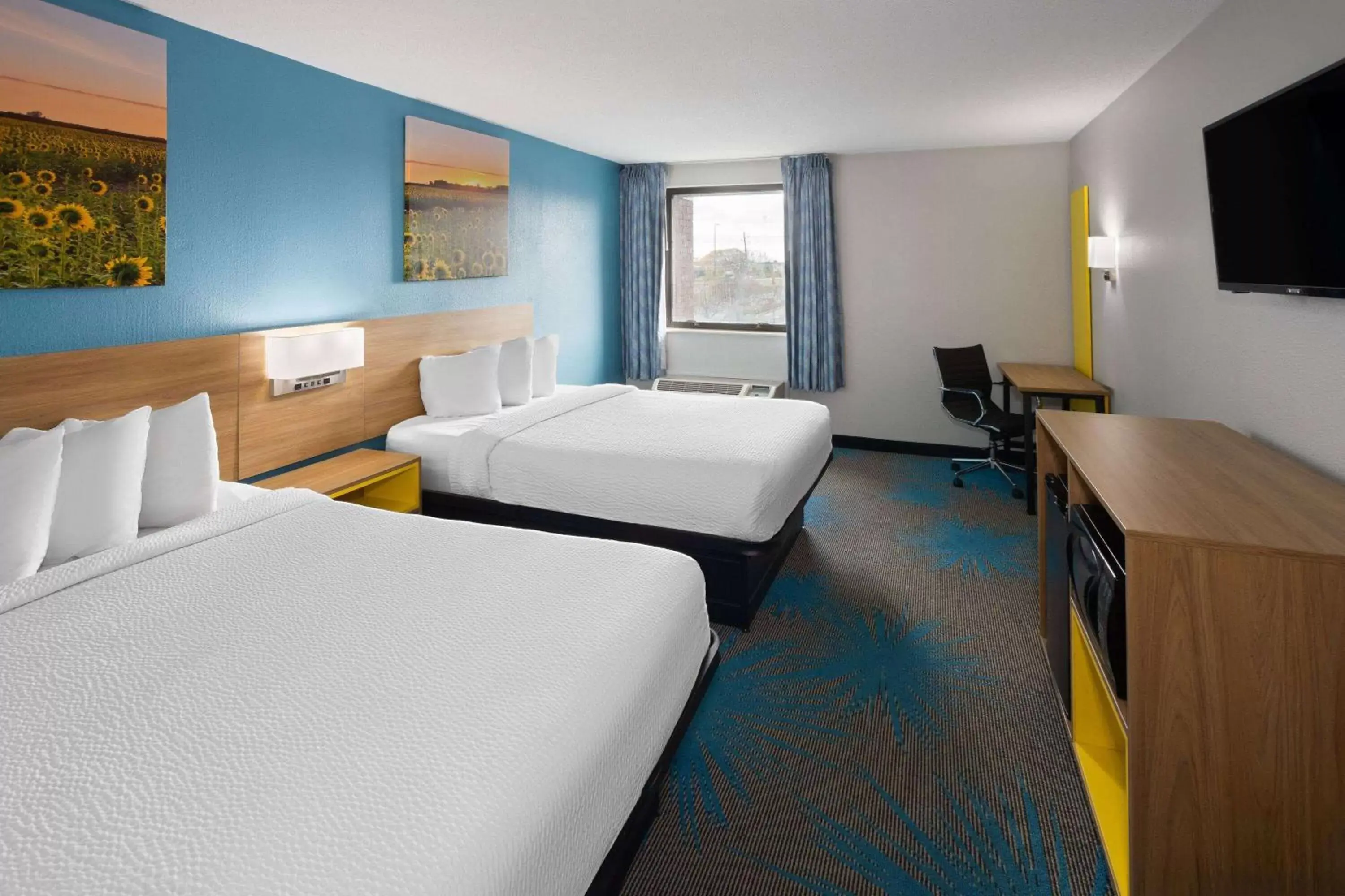 Photo of the whole room in Days Inn & Suites by Wyndham Northwest Indianapolis