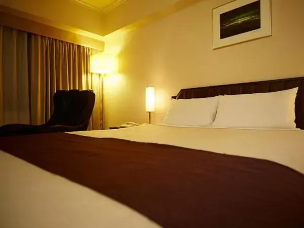 Photo of the whole room, Bed in Hotel New Otani Takaoka