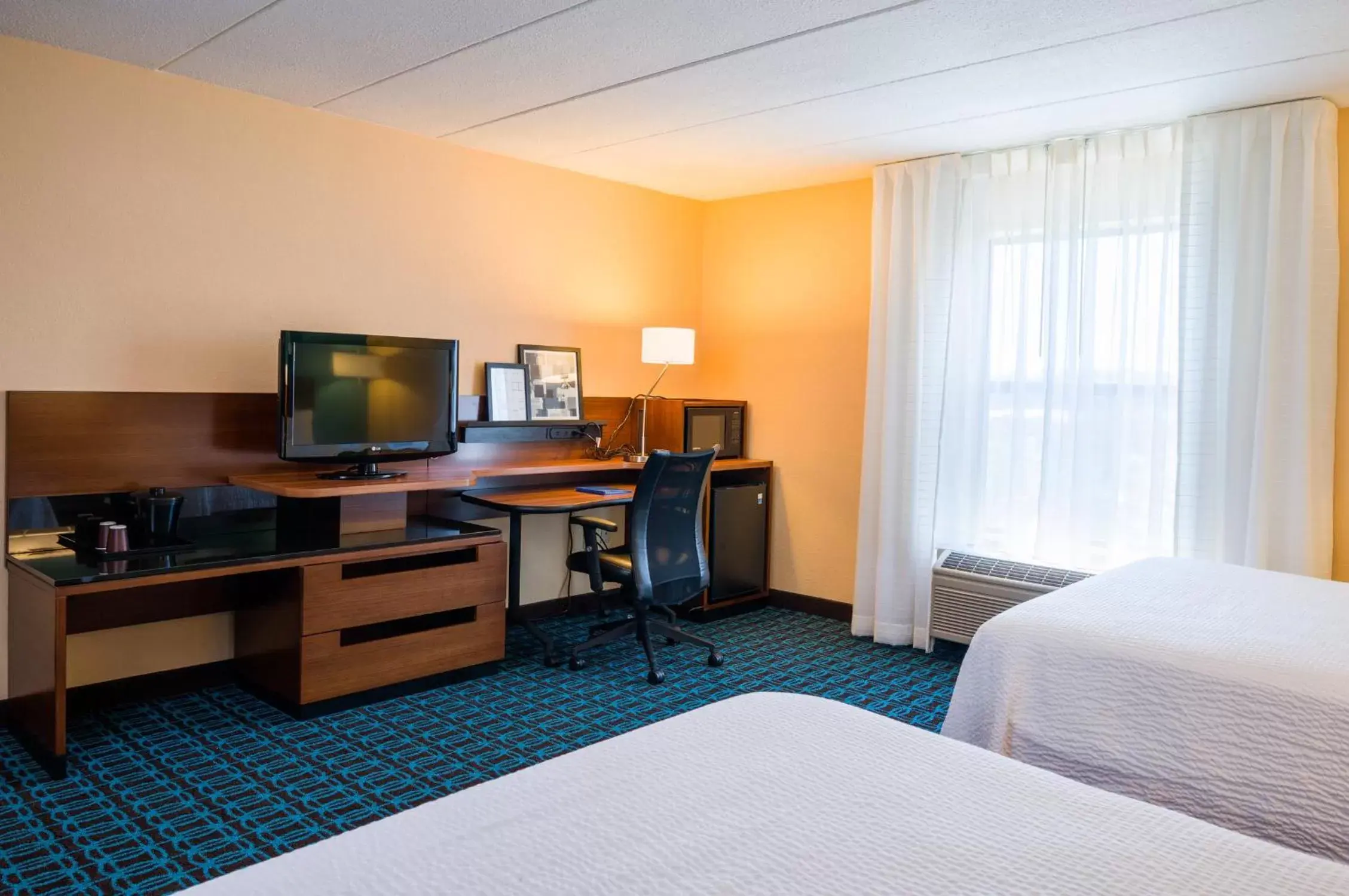 Photo of the whole room, TV/Entertainment Center in Fairfield Inn by Marriott Laurel