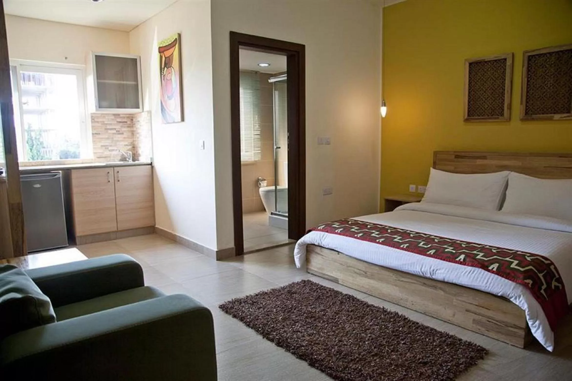 Photo of the whole room, Bed in Roots Hotel Apartment