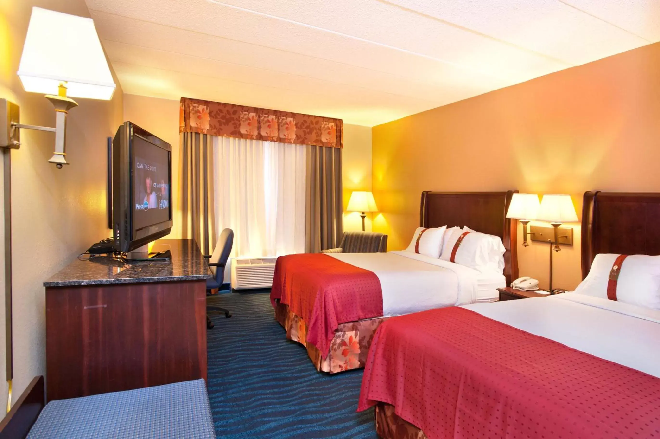 Bed in Holiday Inn Hotel & Suites Council Bluffs, an IHG Hotel