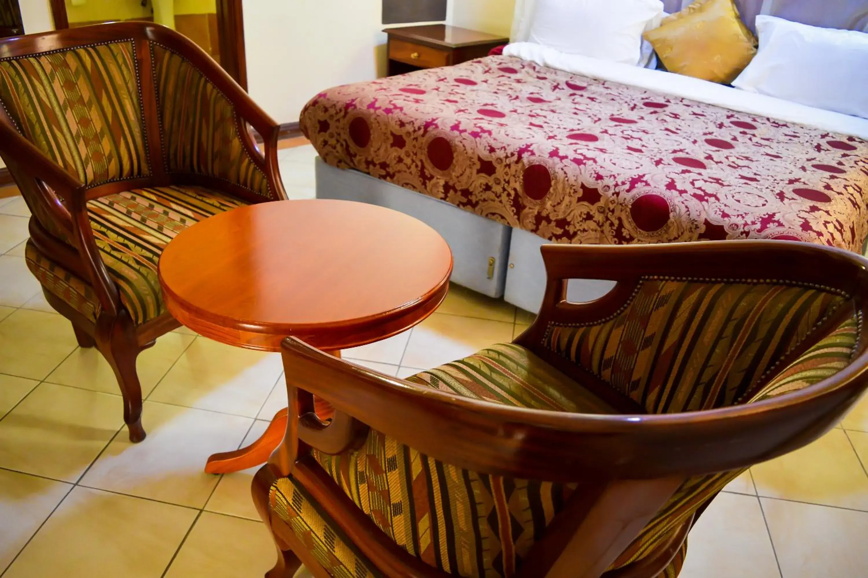 Bedroom, Seating Area in Anthena Hotel