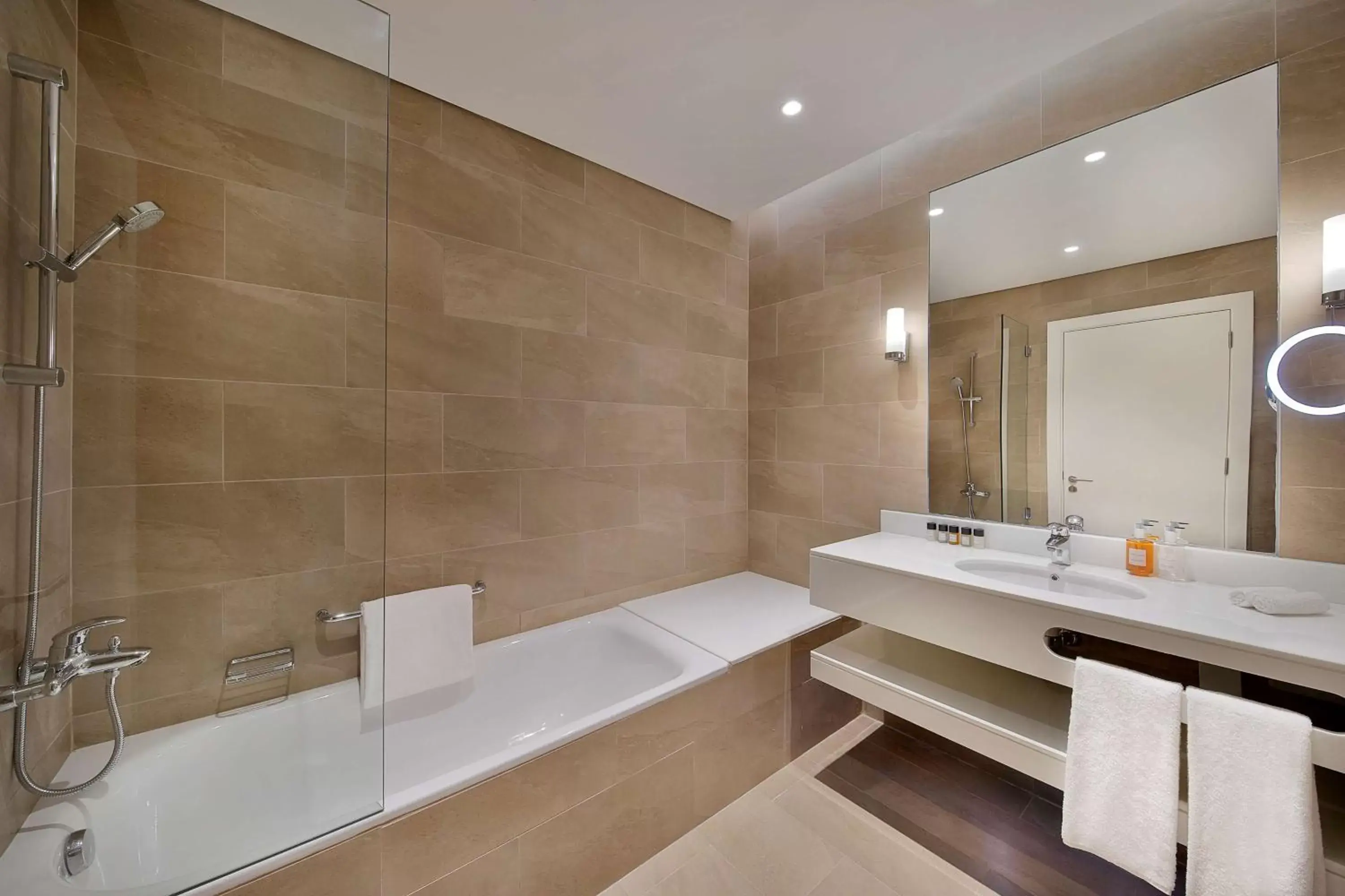 Bathroom in Aleph Doha Residences, Curio Collection By Hilton