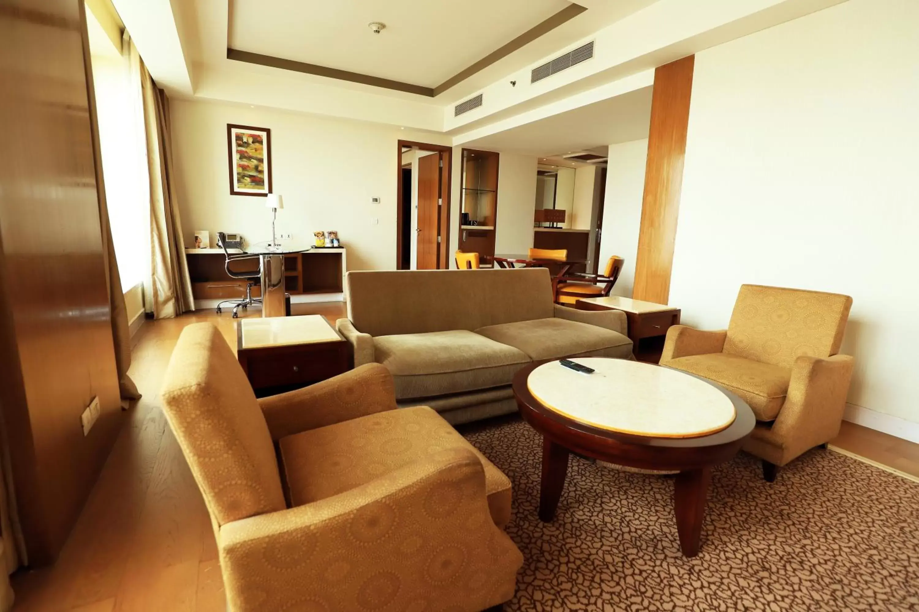 Living room, Seating Area in Crowne Plaza New Delhi Okhla, an IHG Hotel