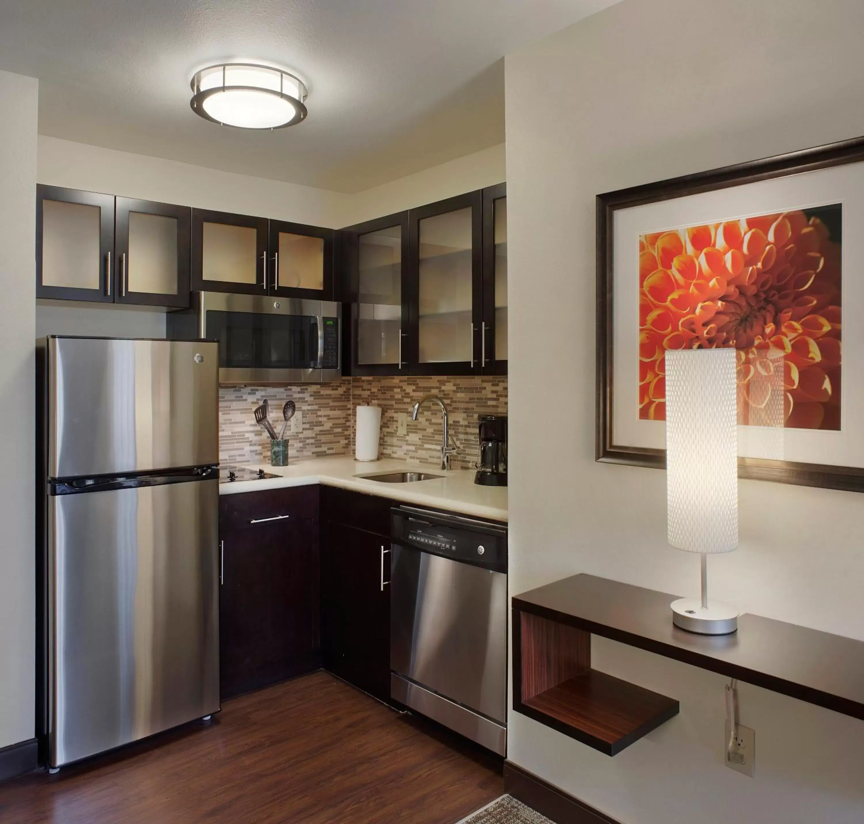 Photo of the whole room, Kitchen/Kitchenette in Staybridge Suites Fayetteville, an IHG Hotel