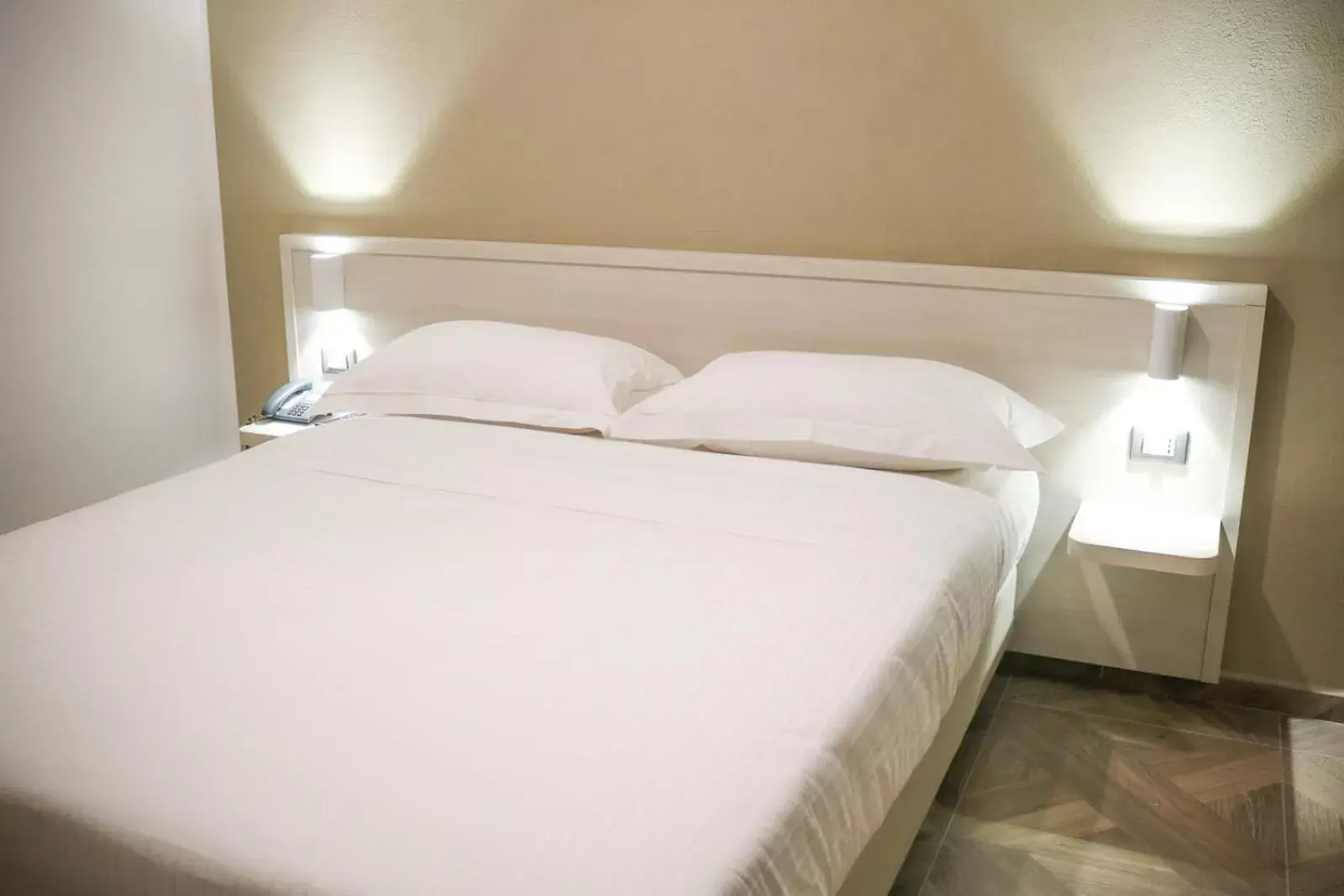 Bed in Hotel Donatello