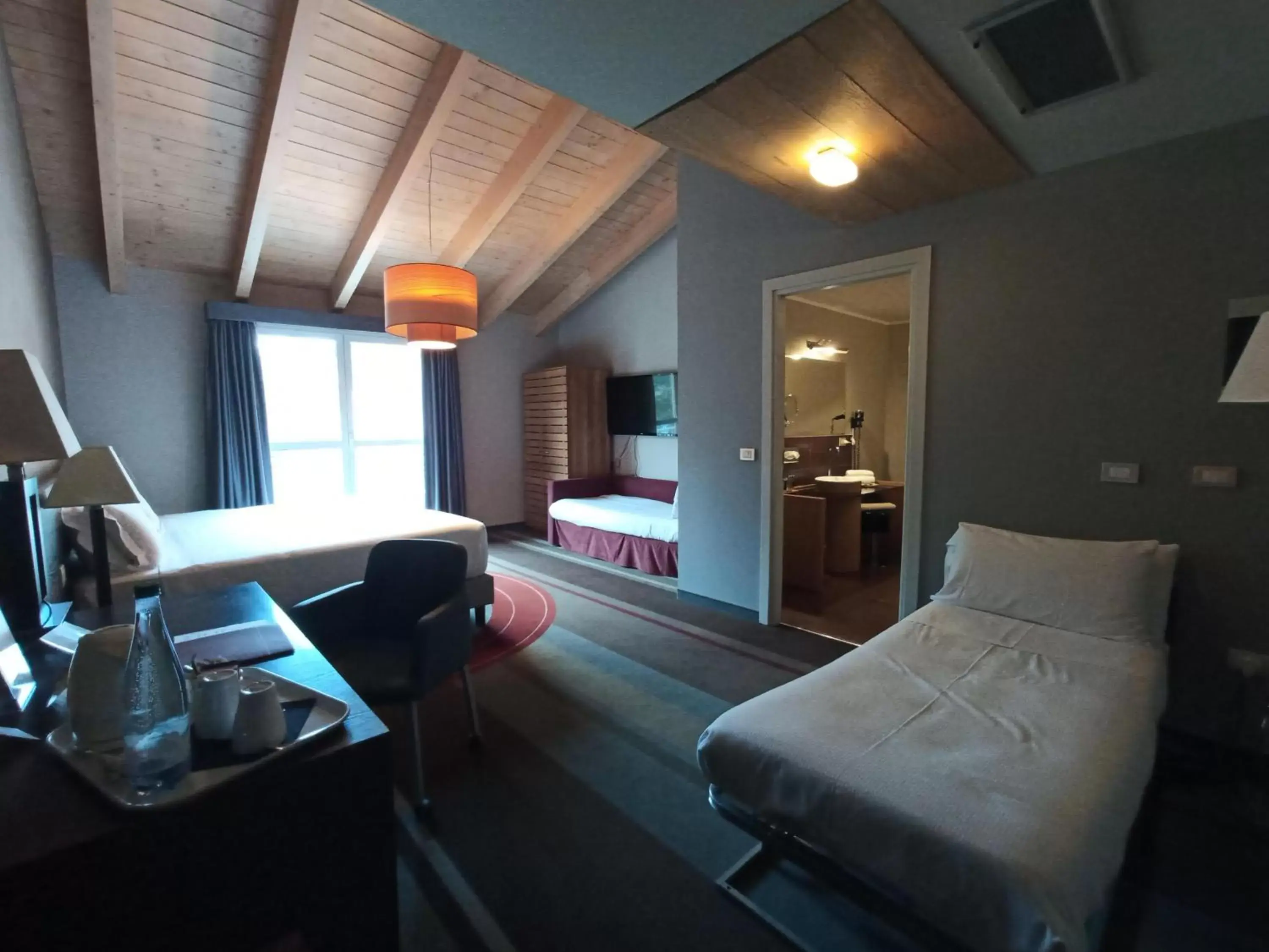 Bedroom, Seating Area in Admiral Park Hotel