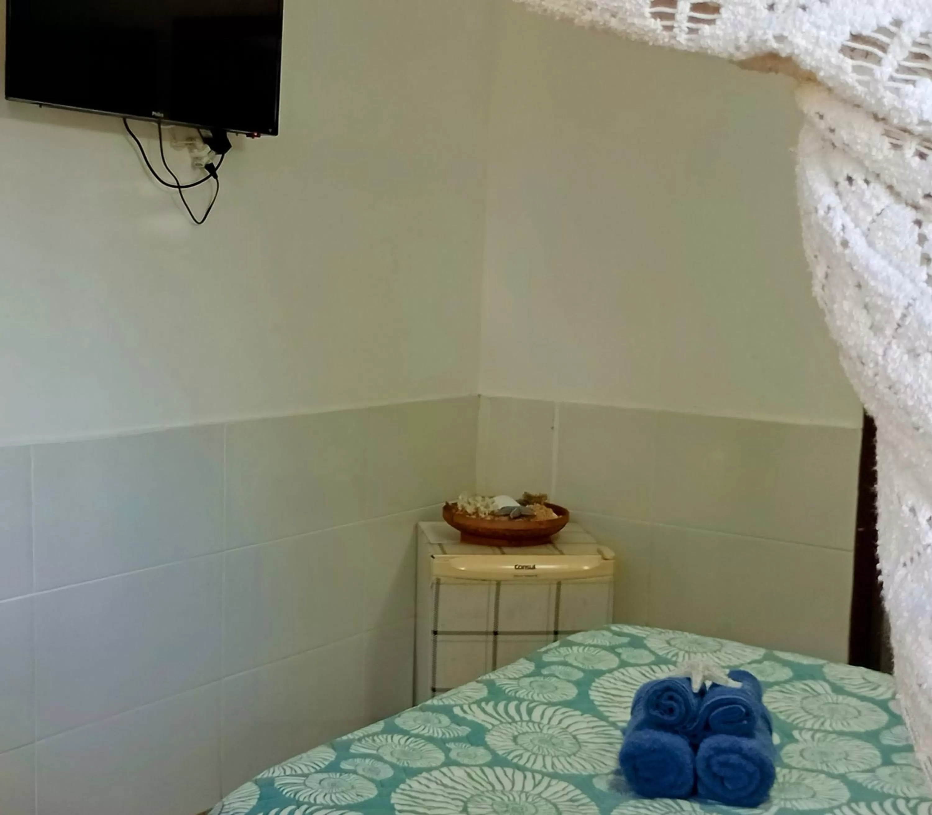 Bed in Hibiscos Pousada